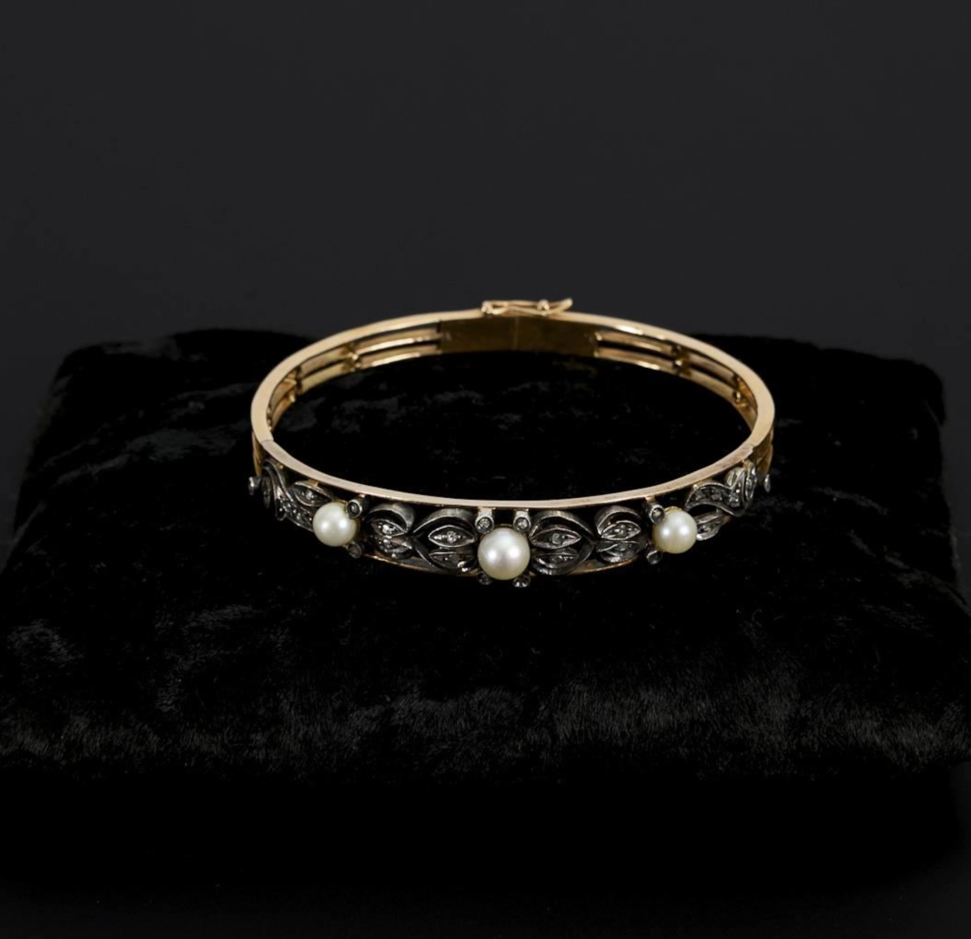 Vintage-style bangle with diamond chips and pearls.