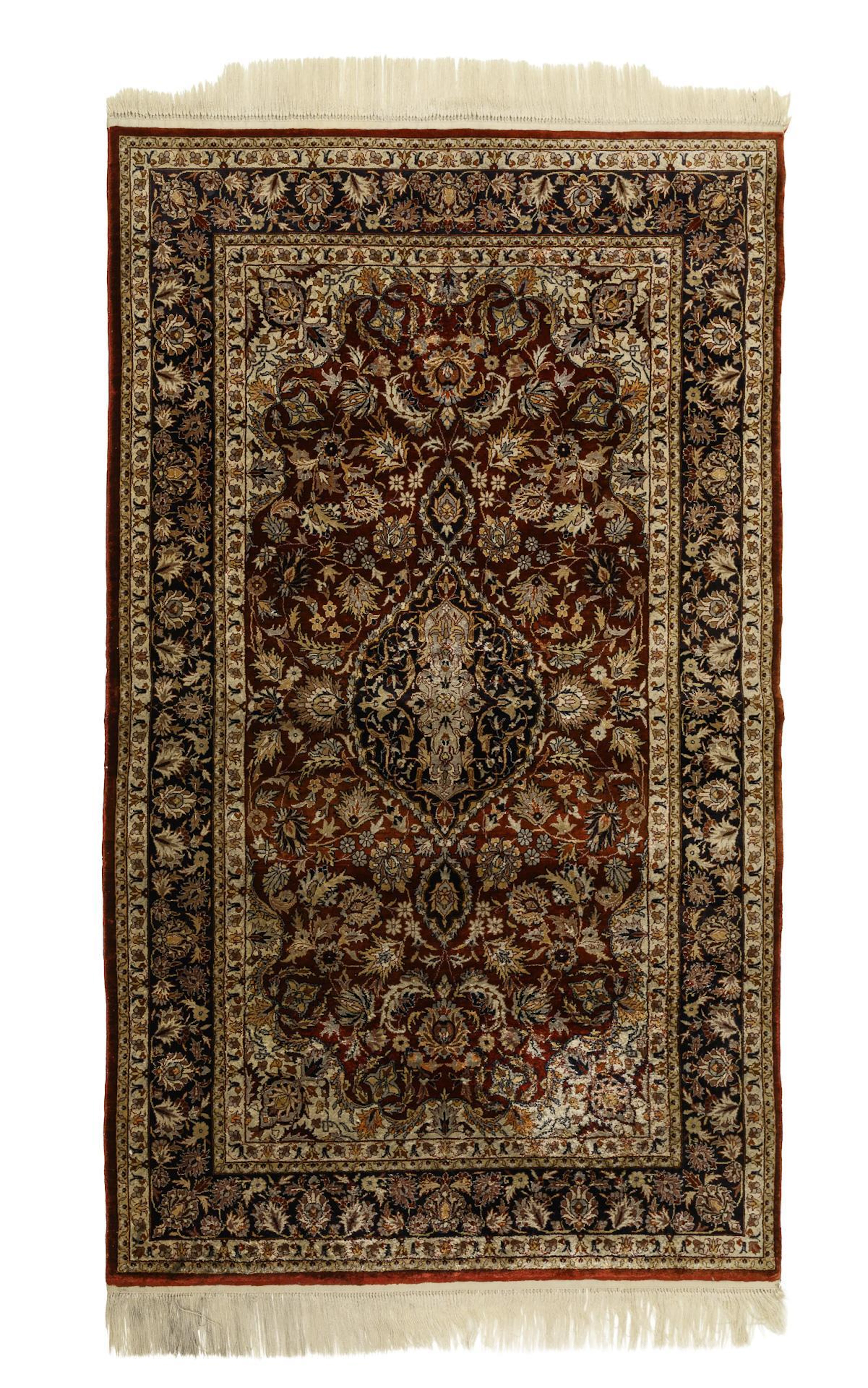 Small oriental medallion carpet.