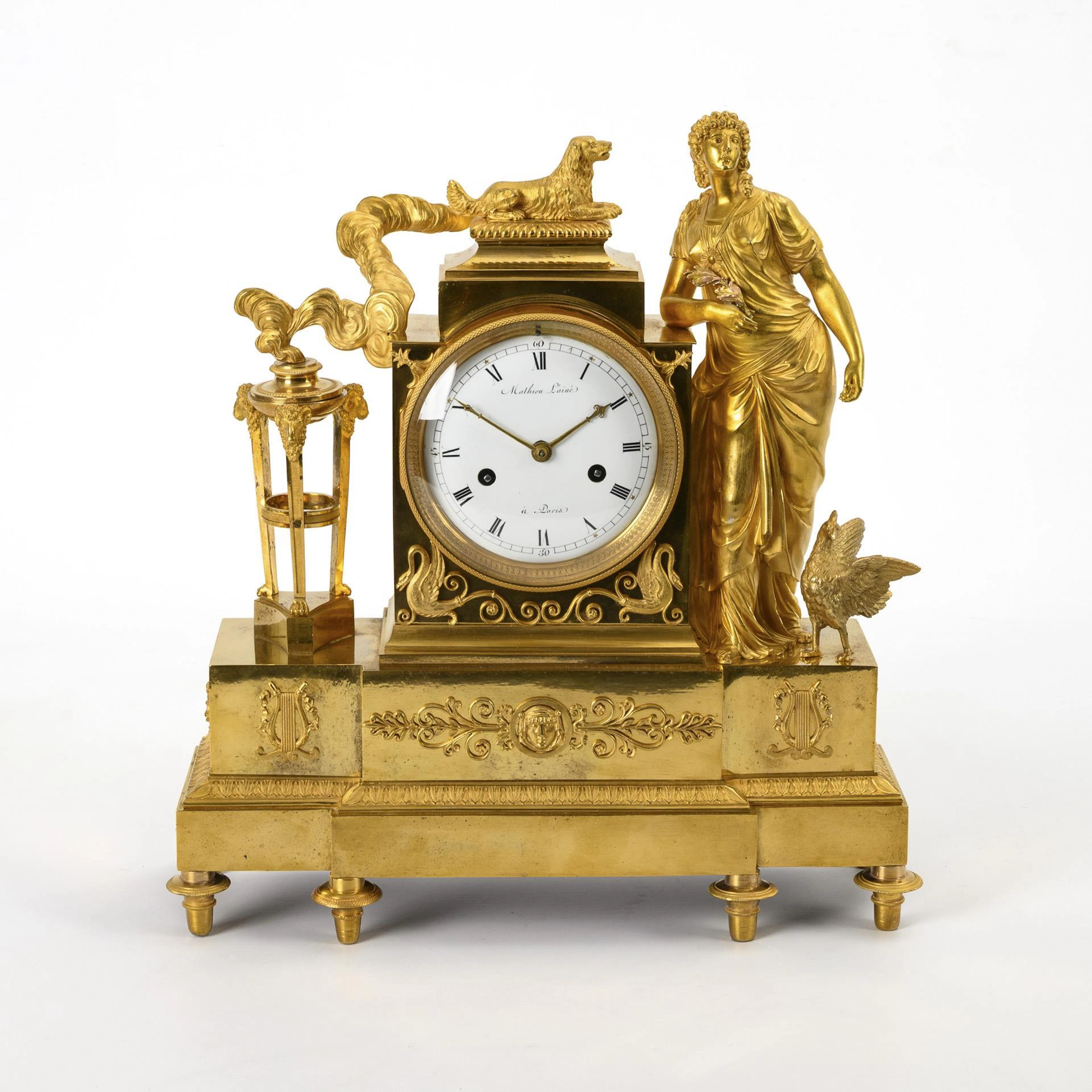 Empire bronze pendulum with allegory of art.