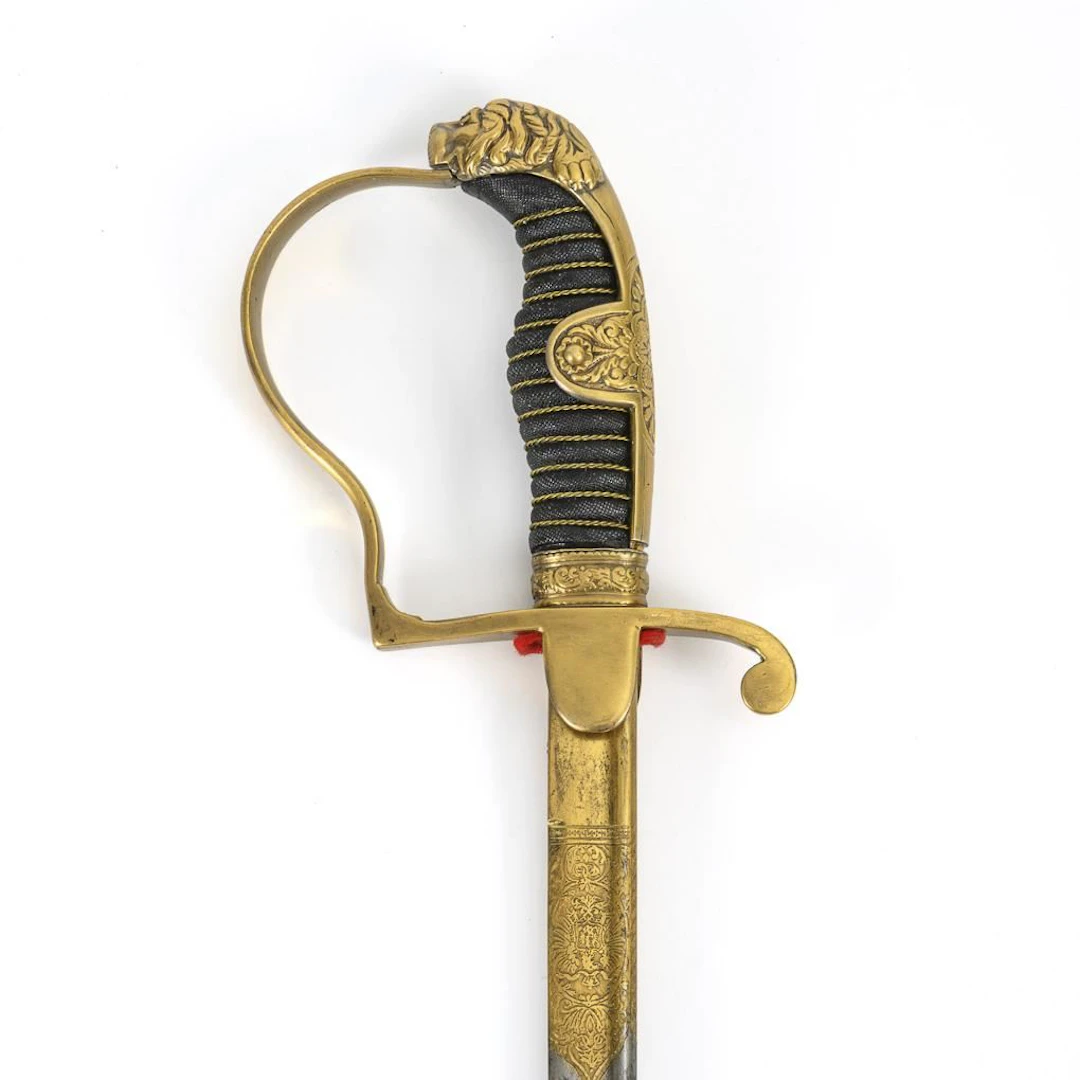 Lion's-head saber with Damascus blade.