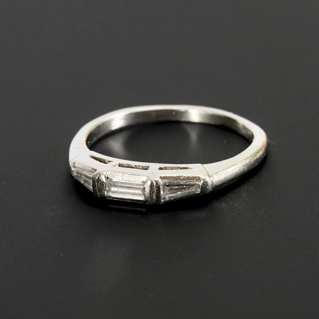 Platinum ring with 3 diamonds.