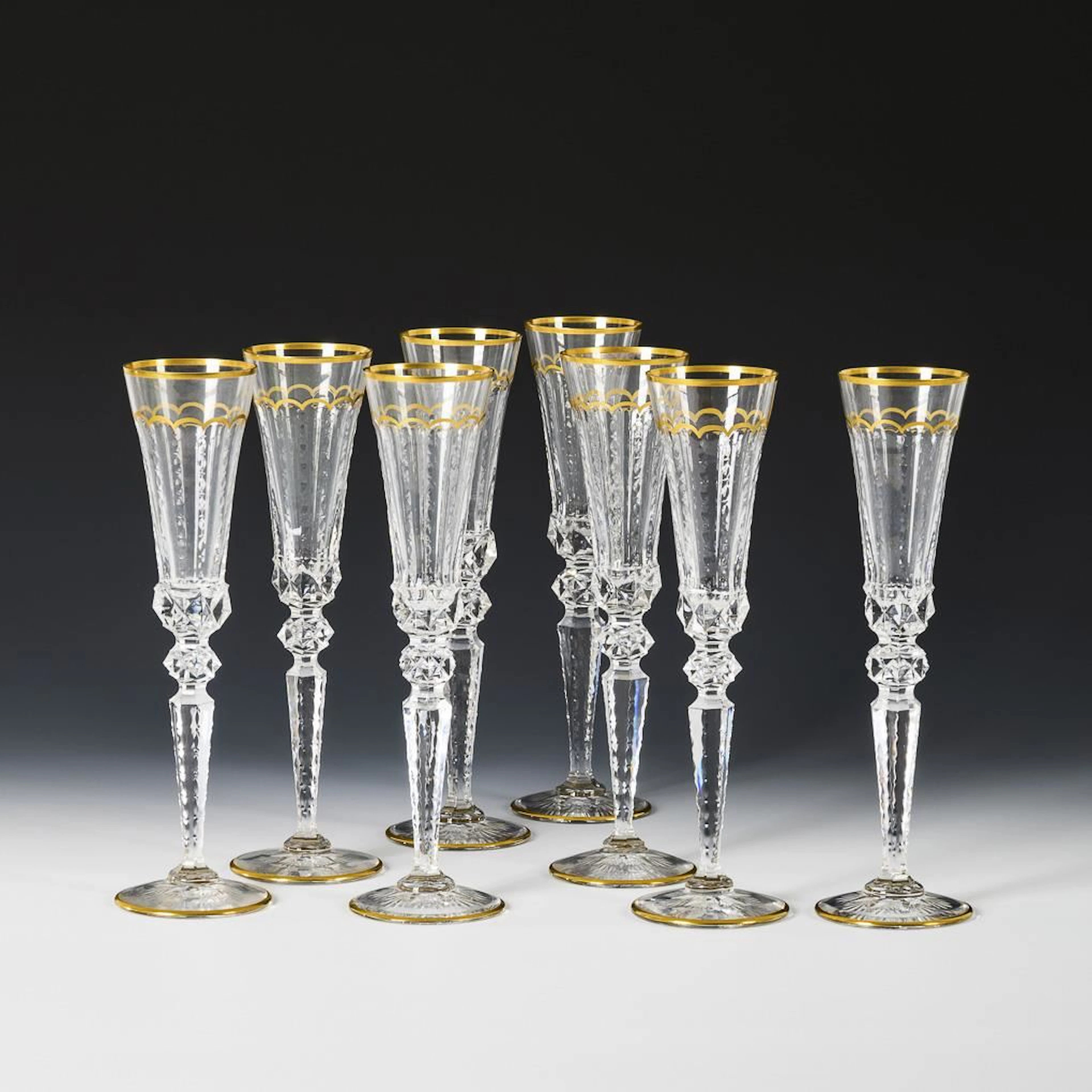 8 "Excellence" champagne glasses. St. Louis.