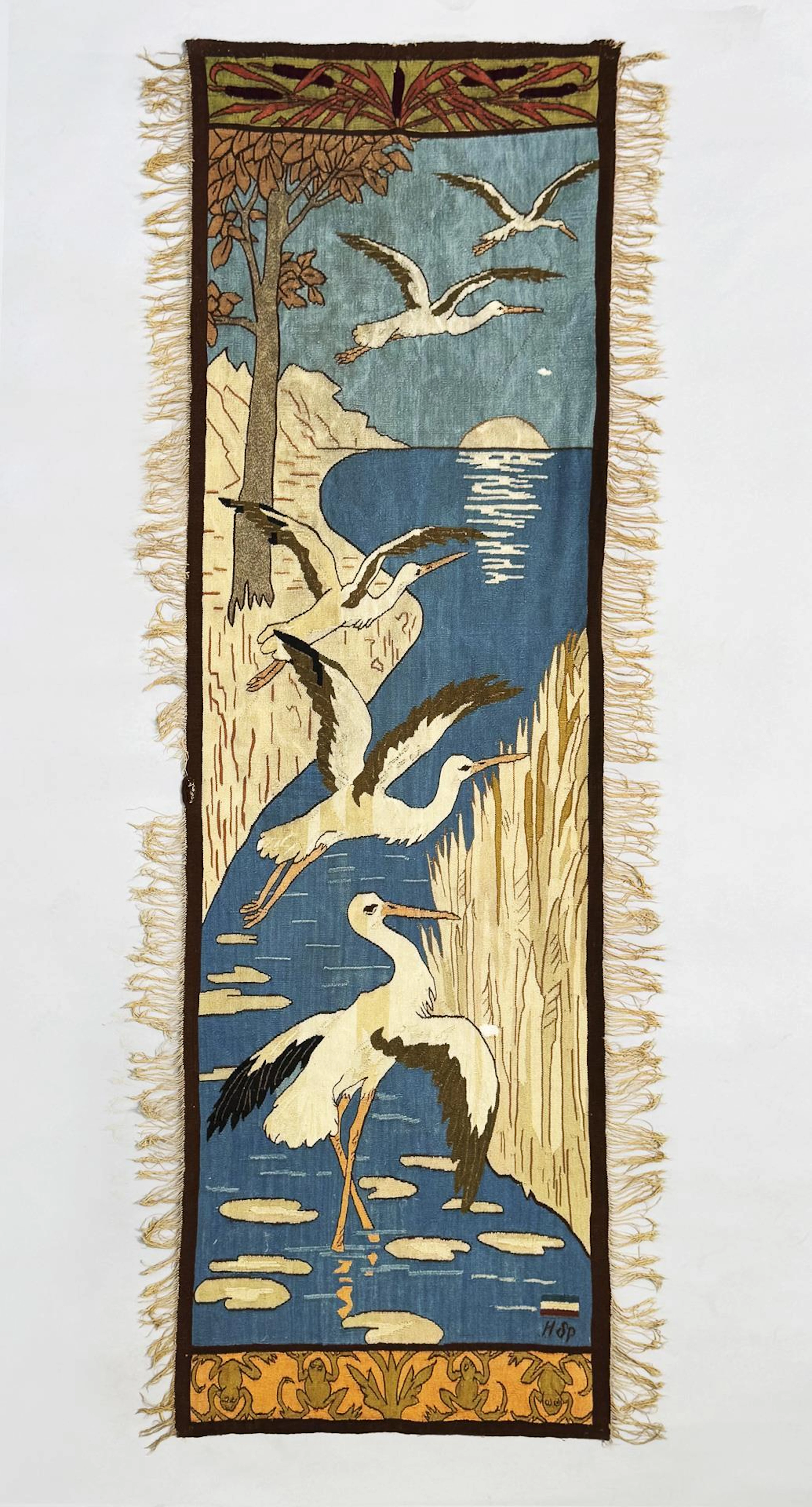 Art Nouveau wall hanging: Five storks.
