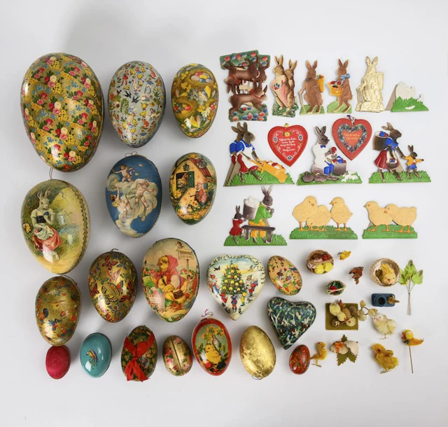 Collection of 17 cardboard Easter eggs and standing figures made of