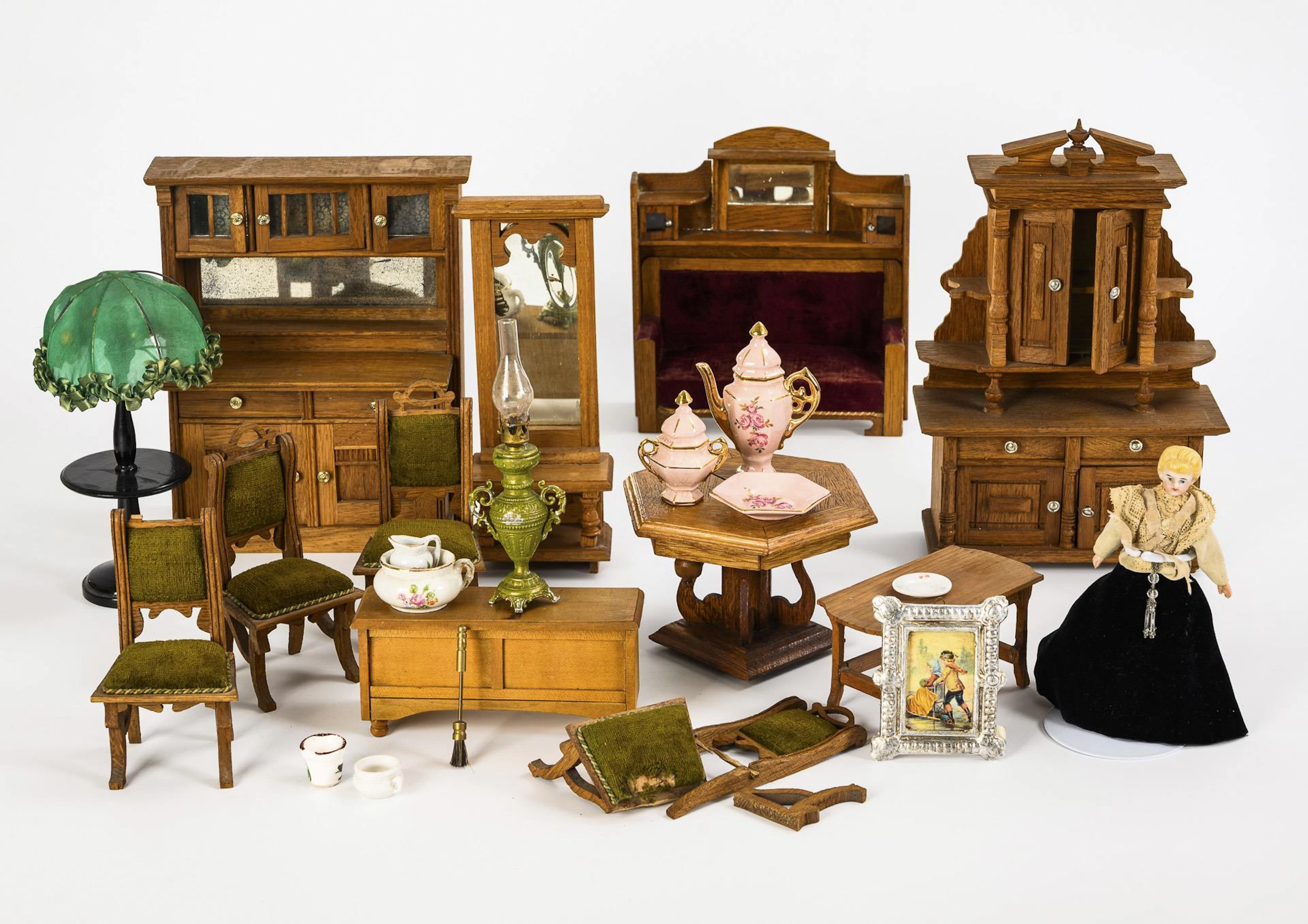 A collection of Wilhelminian style furniture and doll for the doll's house.