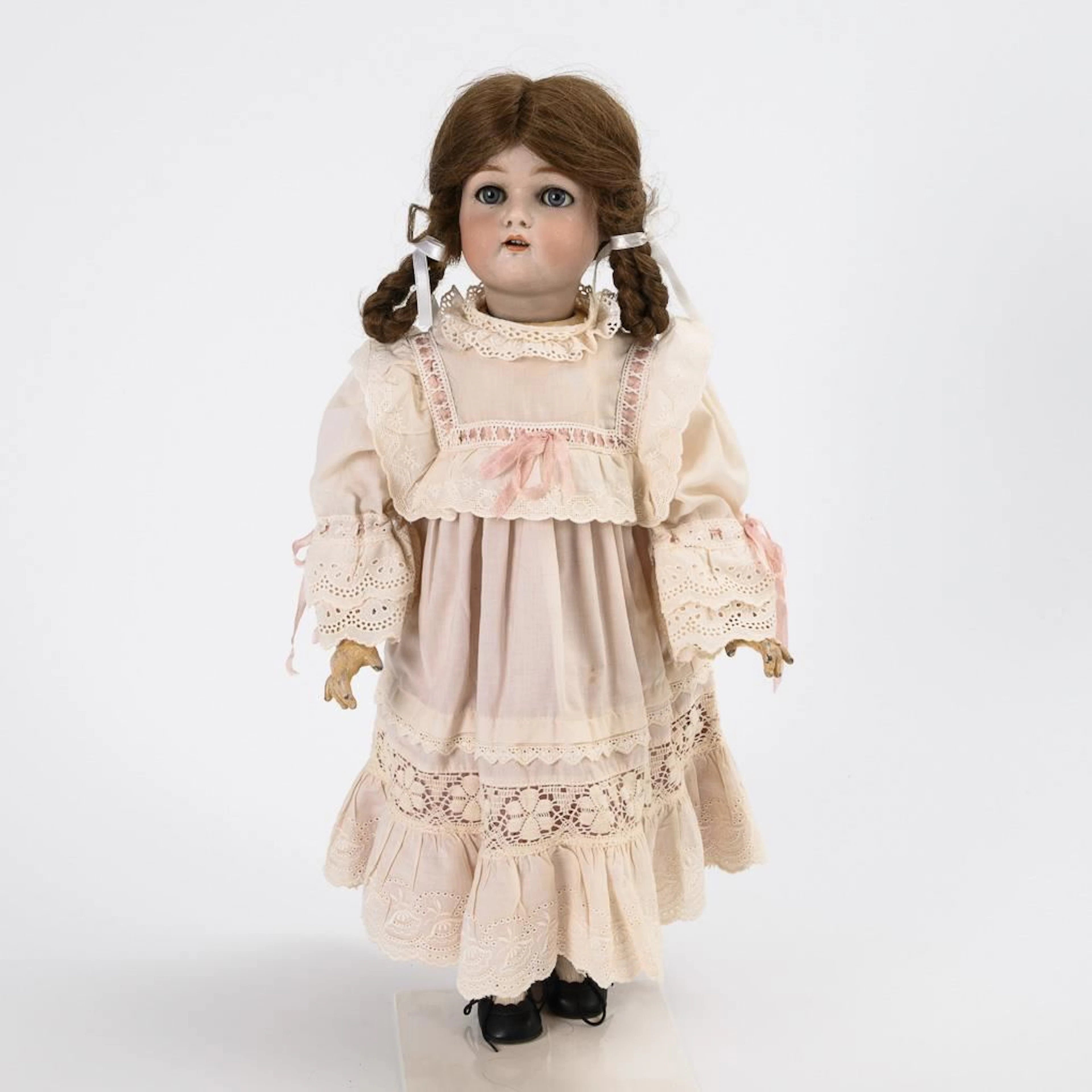 Doll in a pink dress. Kämmer & Reinhardt.