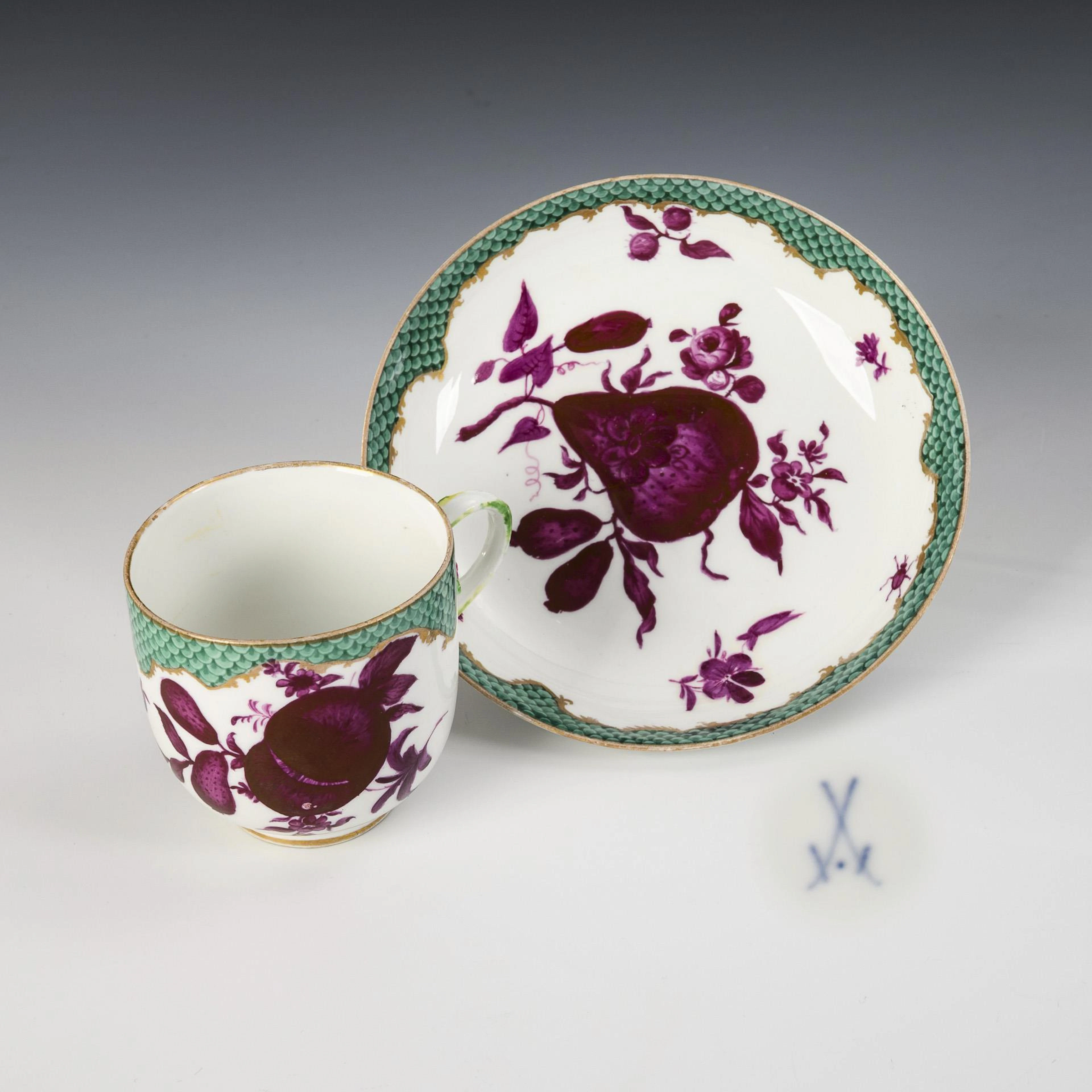 Baroque cup with purple painting. Meissen.