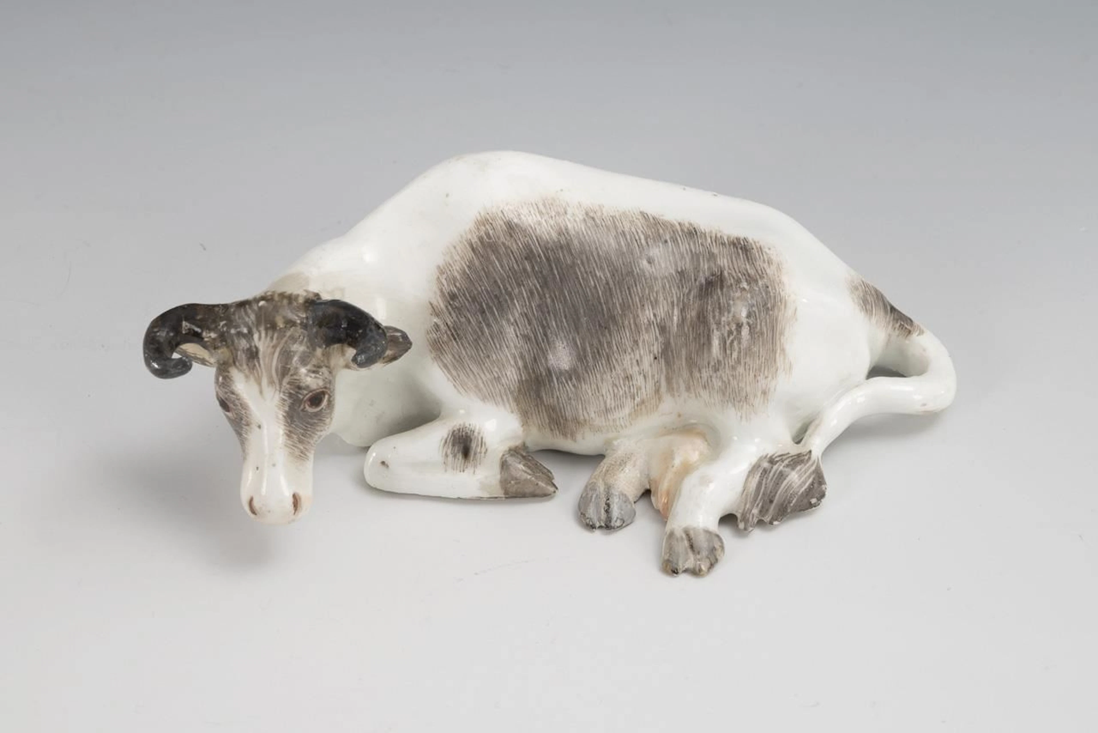 Reclining Cow. Meissen.