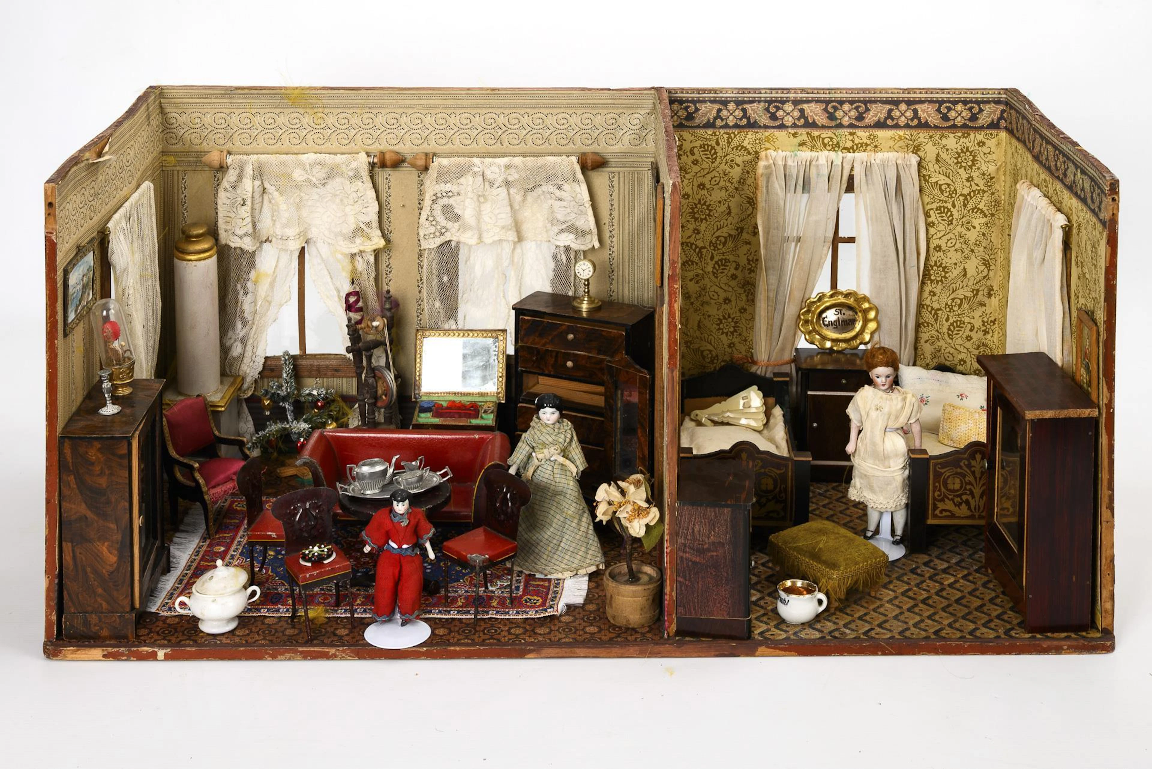 2-room doll's house with tin furniture.