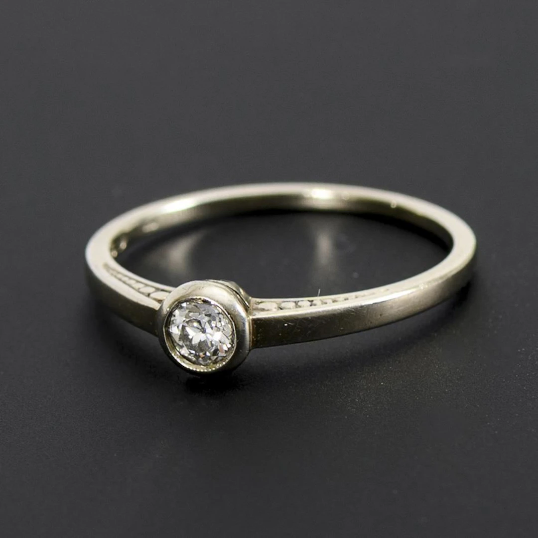 Ring with a vintage solitaire.
