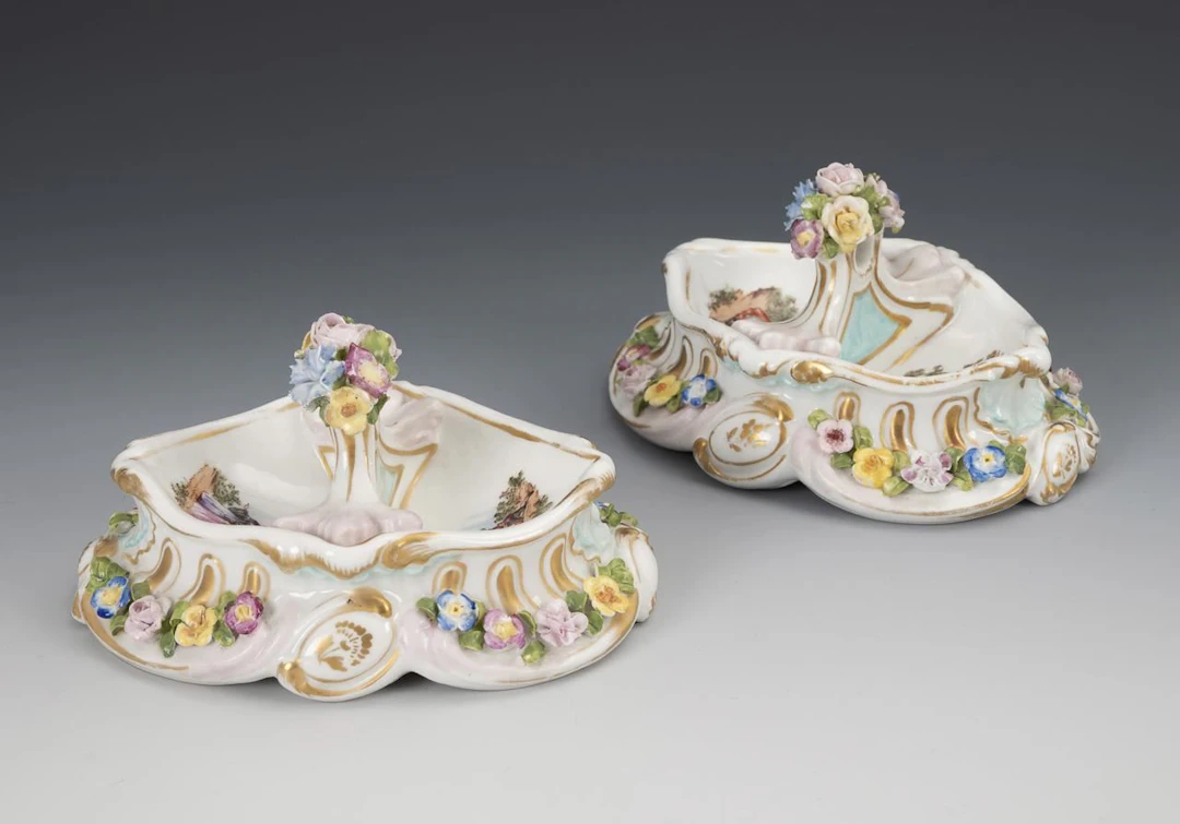 Pair of saliers with floral decoration.
