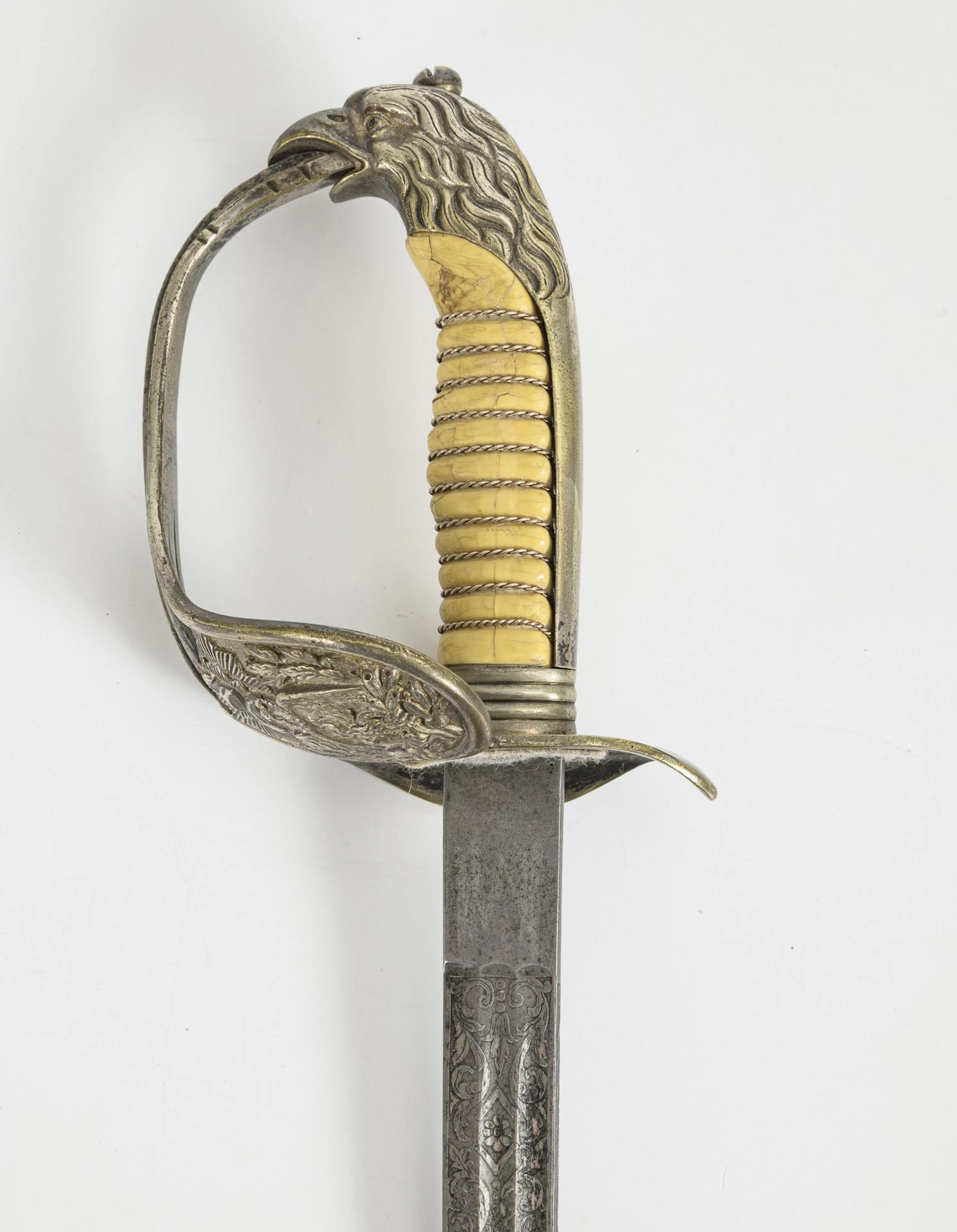 Sword with decorated Kling and eagle's head.
