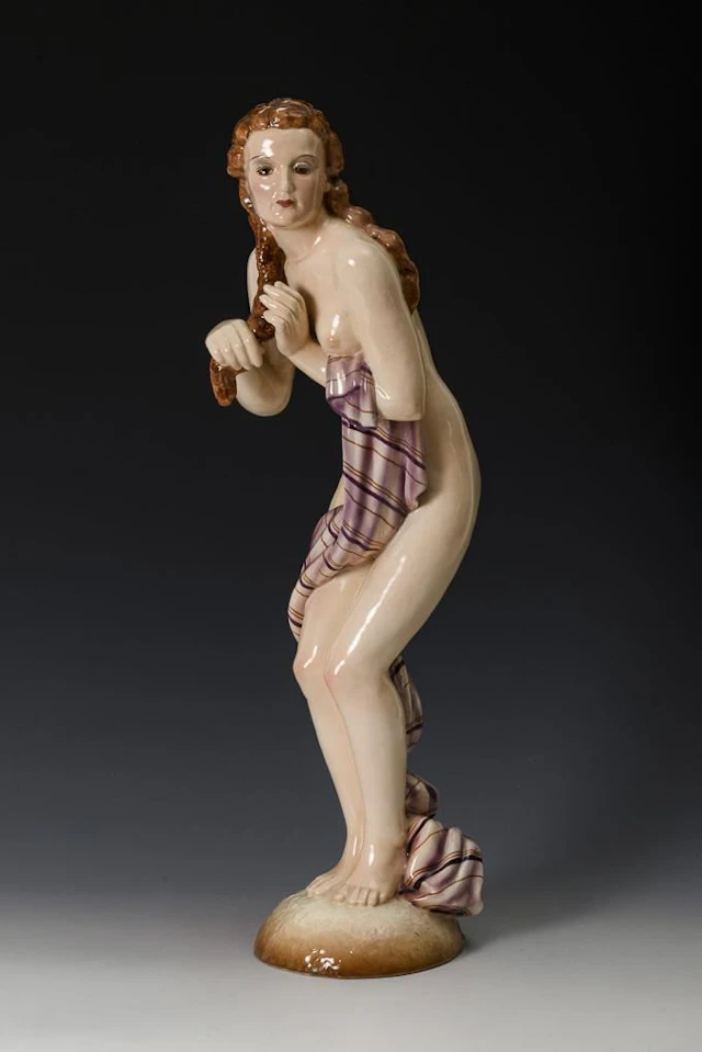 Art Deco nude girl braiding her hair. Keramos, Viennese art ceramics.