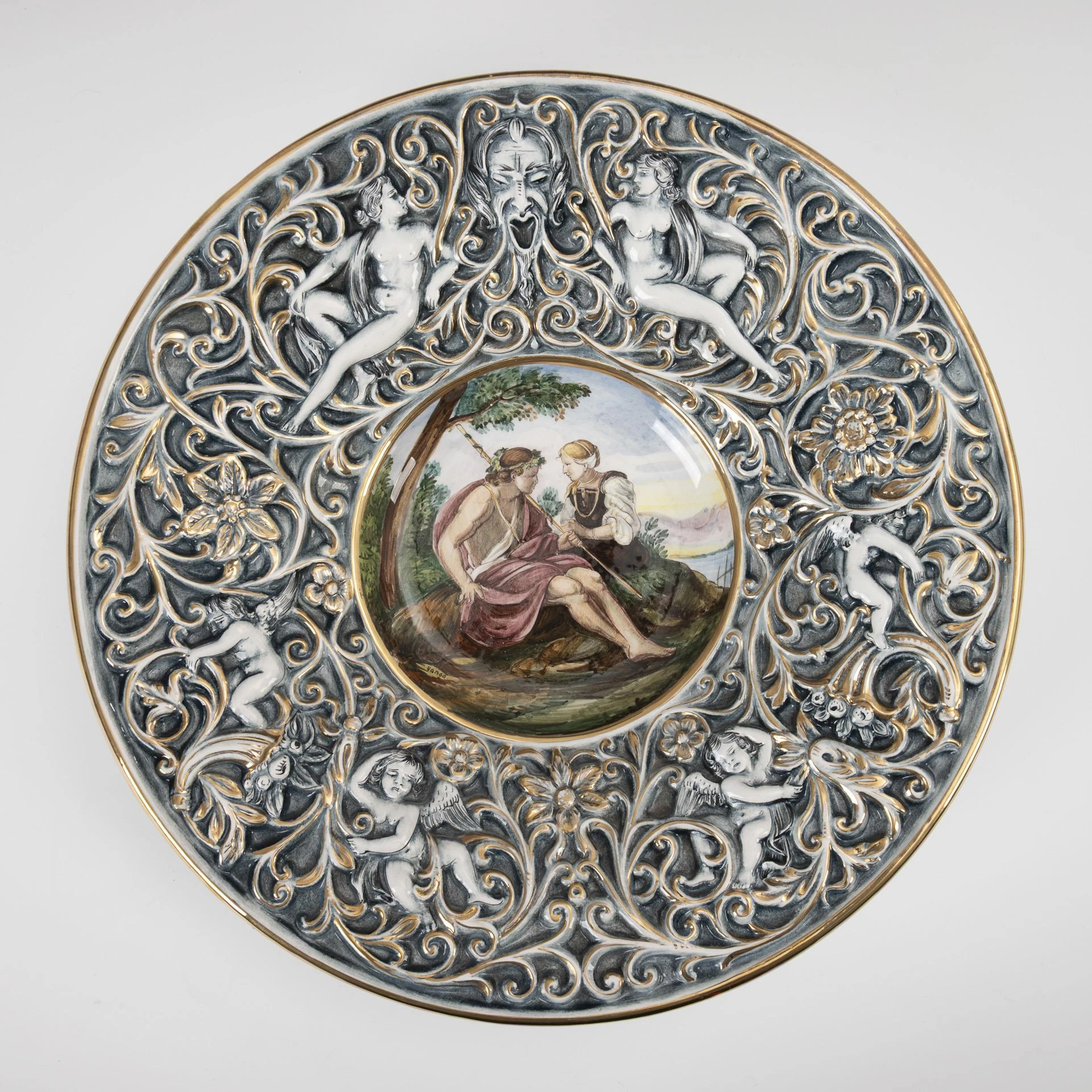 Pompous historicism wall plate with shepherd scene. R. Capodimonte.
