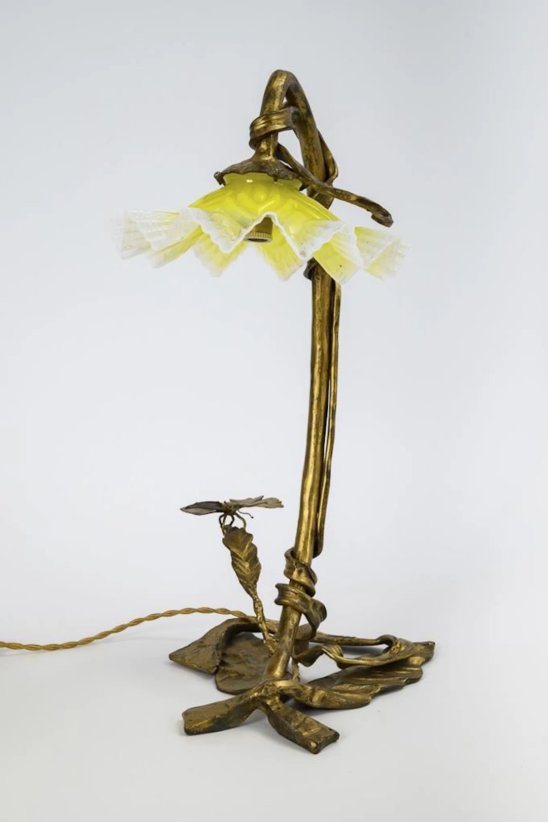 Art Nouveau lamp with bronze base.