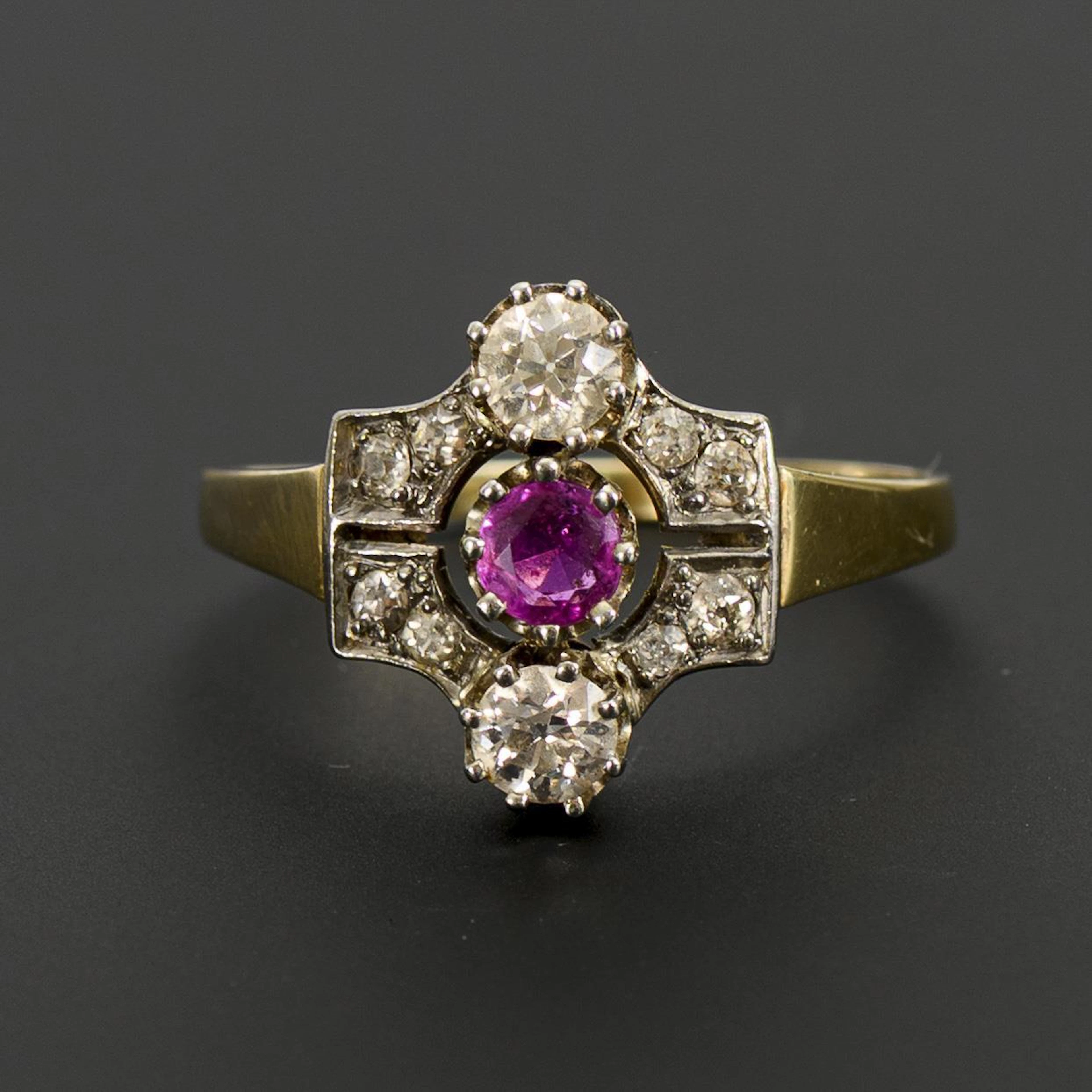Art deco ring with red colored stone and old-cut diamonds.