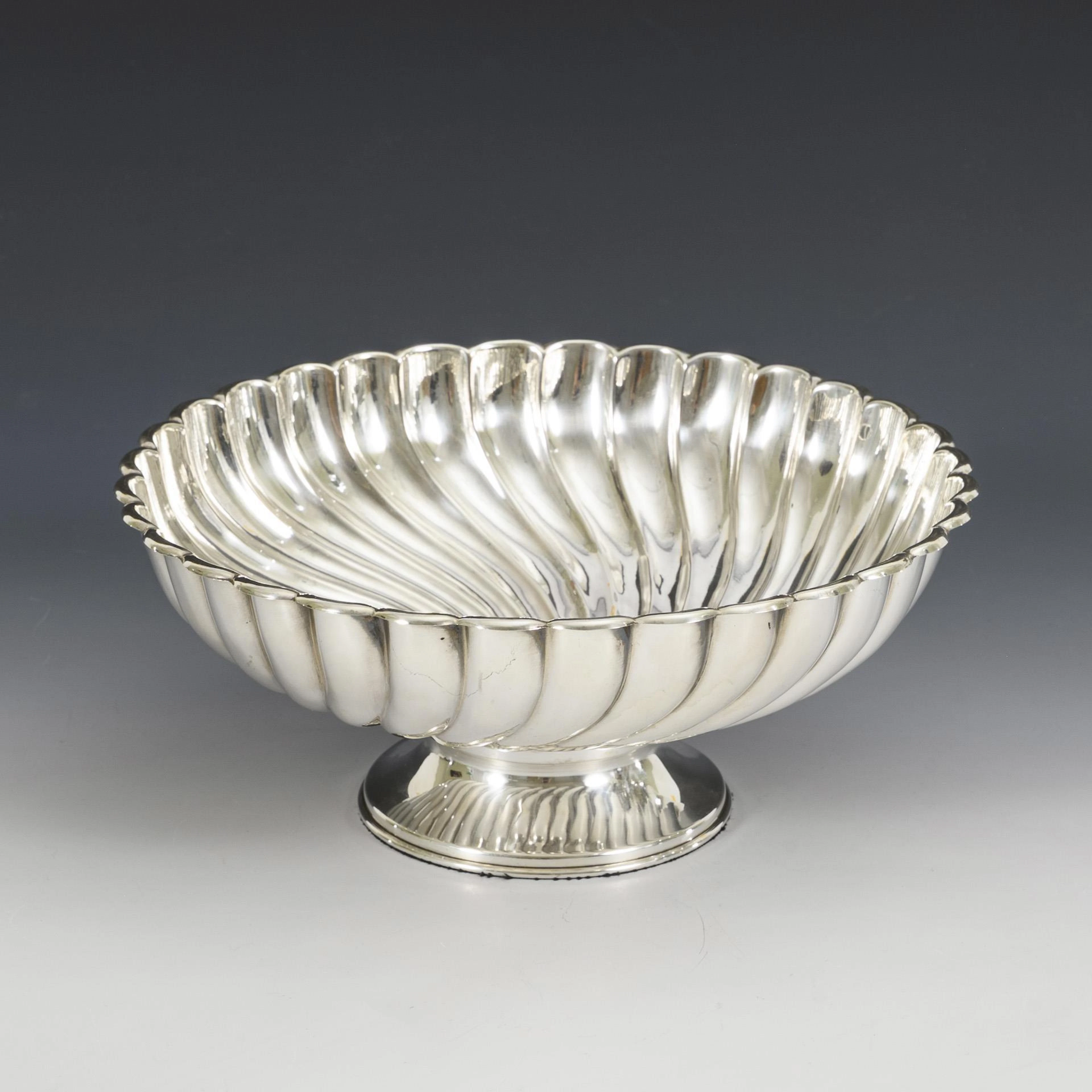 Large silver bowl.