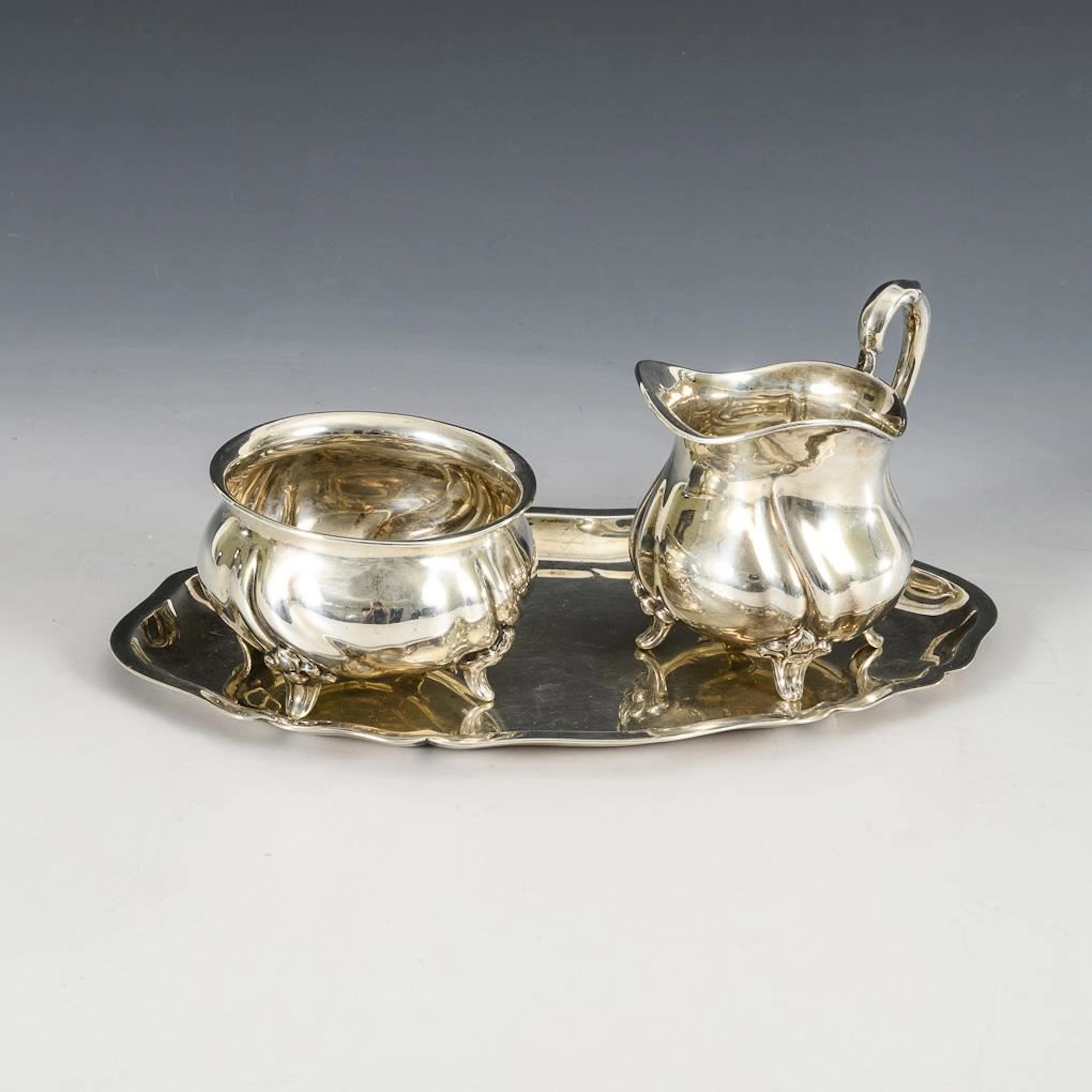 Silver sugar and cream set on a tray. Jakob Grimminger, Schwäbisch Gmünd.
