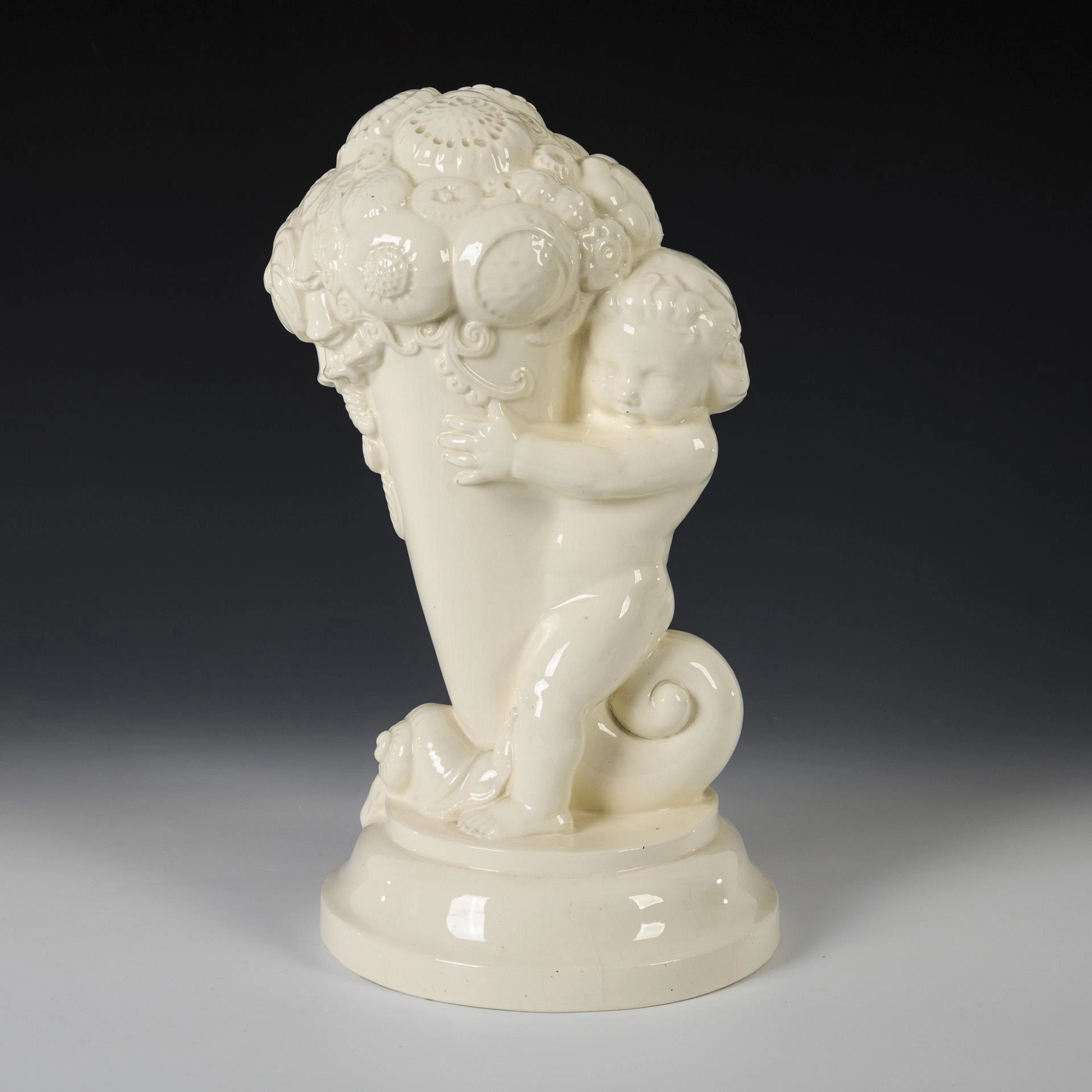 Art Nouveau putto with cornucopia. Wächtersbach.