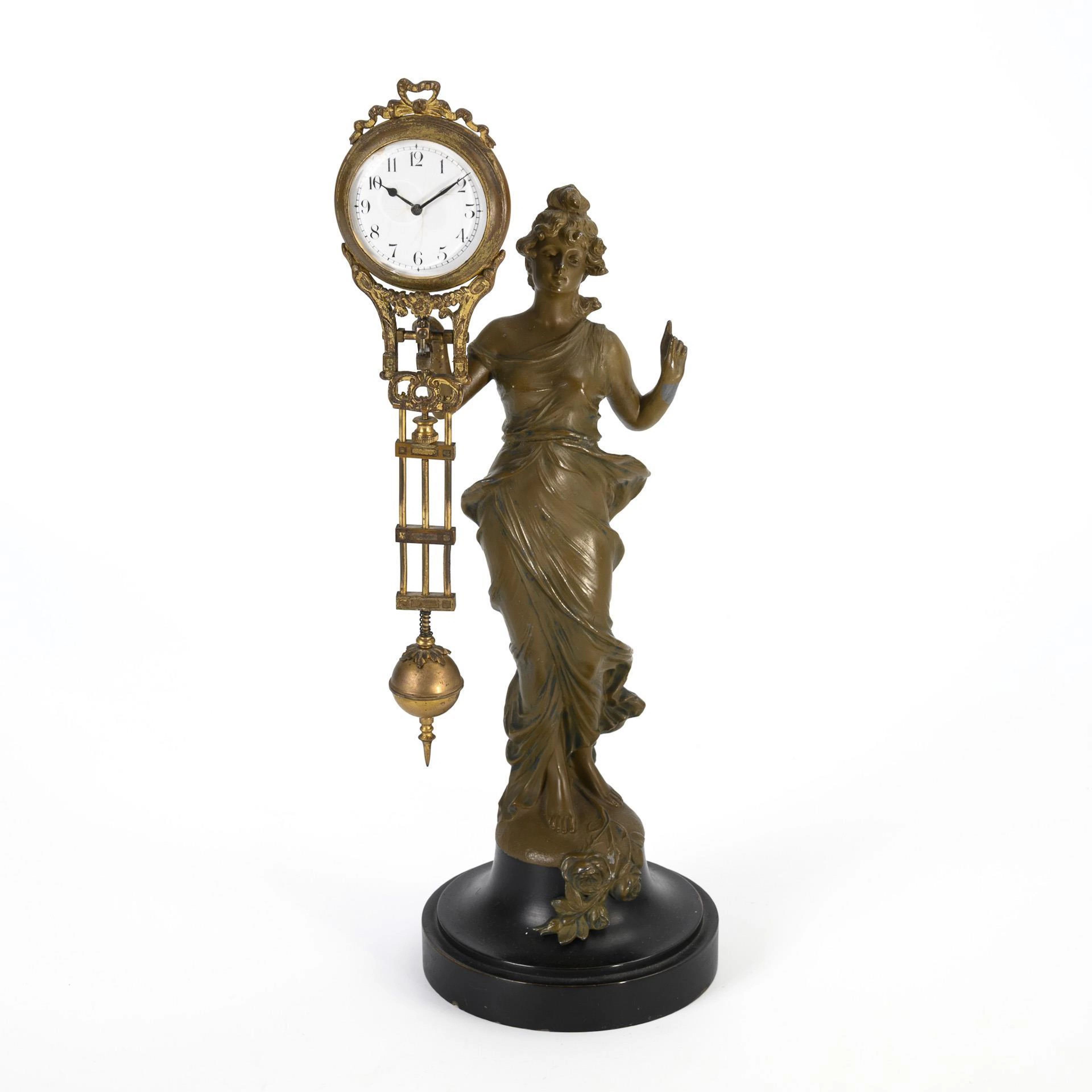 Art Nouveau swinging pendulum clock.