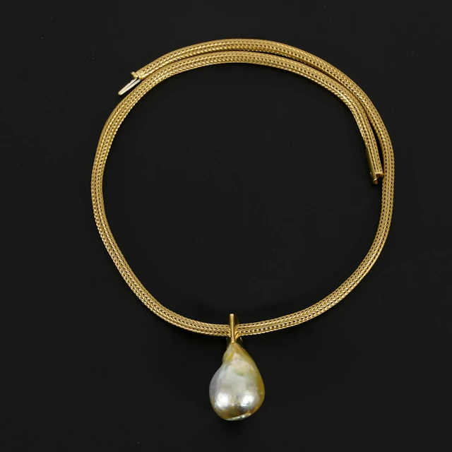 Knitting necklace with baroque South Sea pearl.