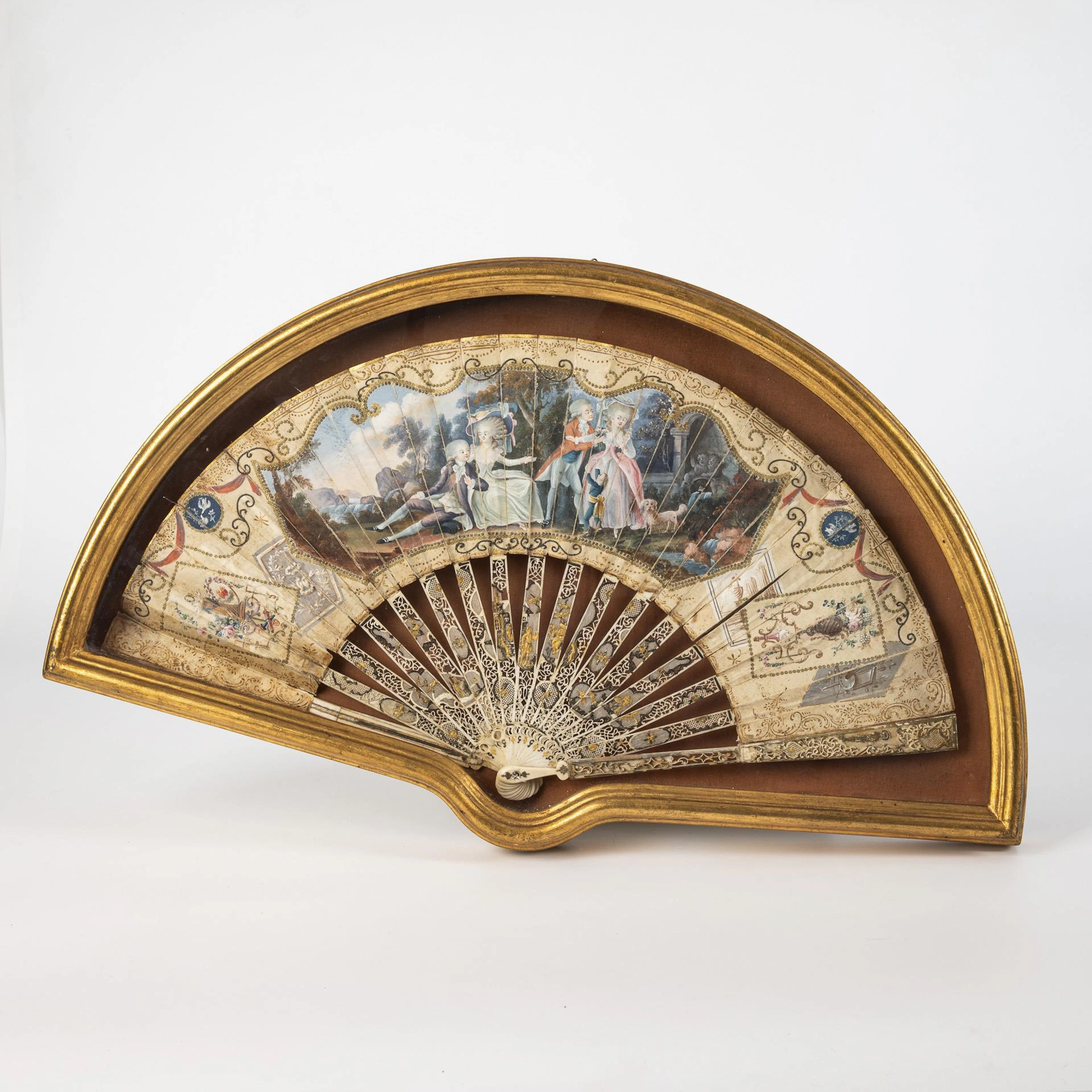 Historical hand fan with romantic scene.