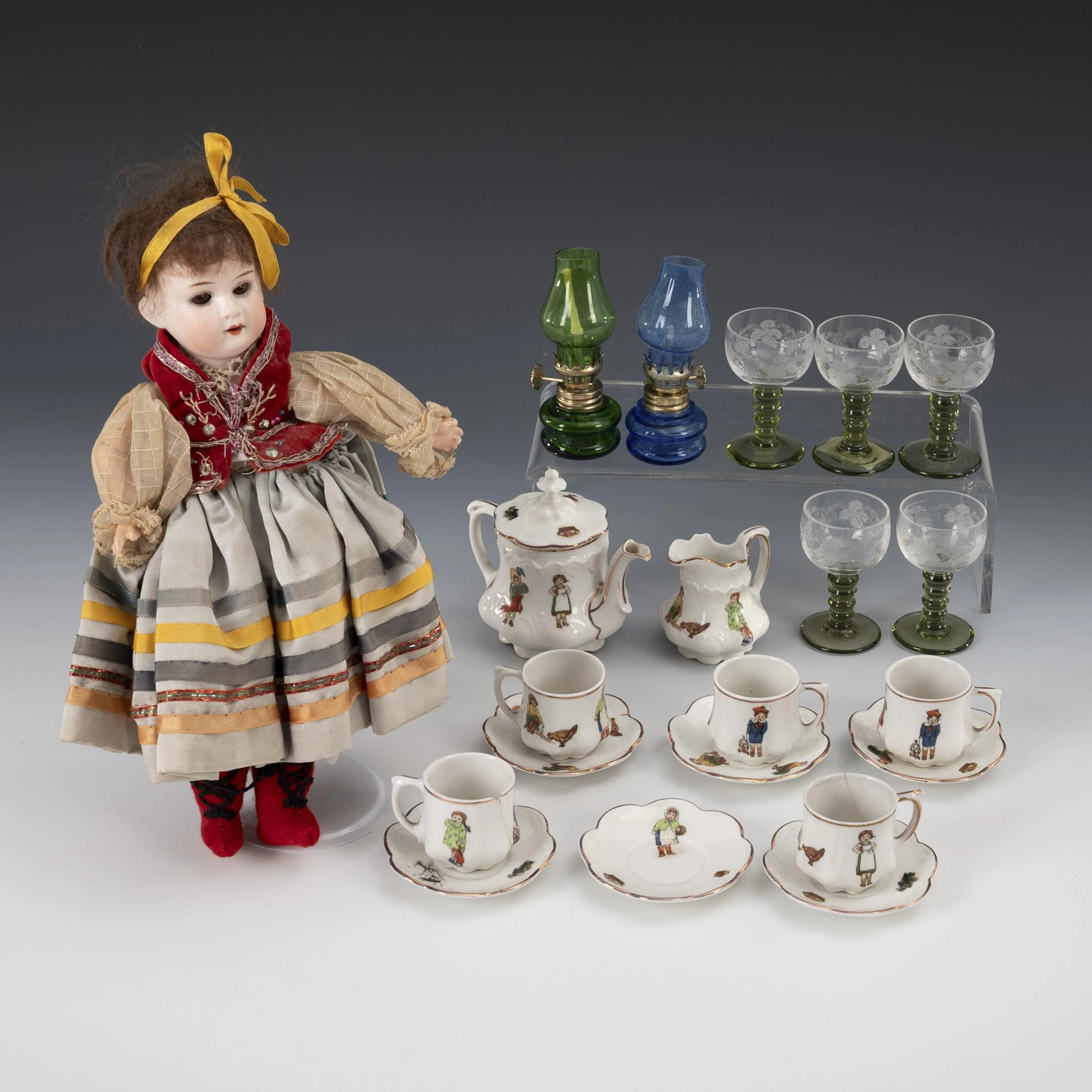 Small doll Armand Marseille and crockery set for the doll's house.