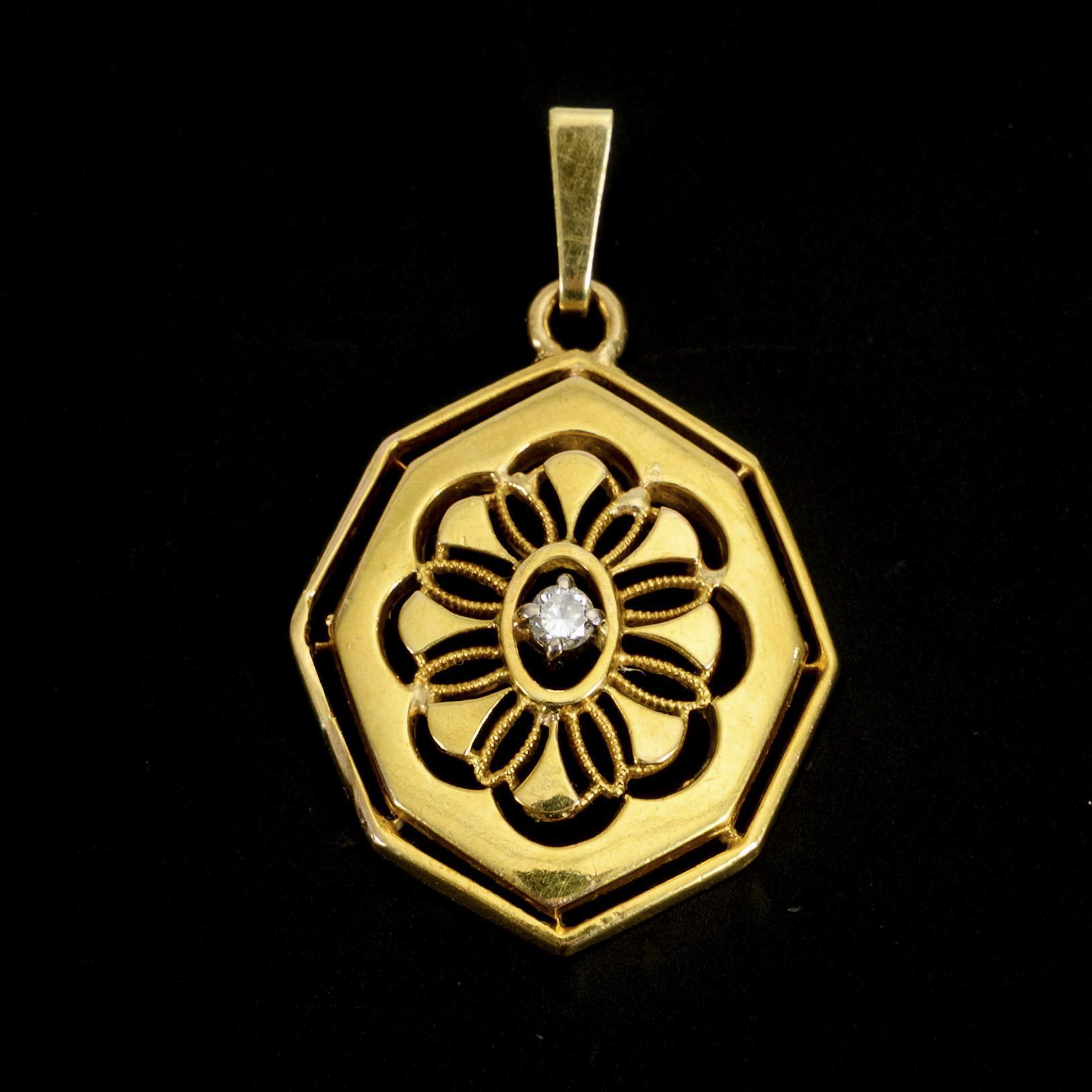 Pendant with flower-shaped opening.