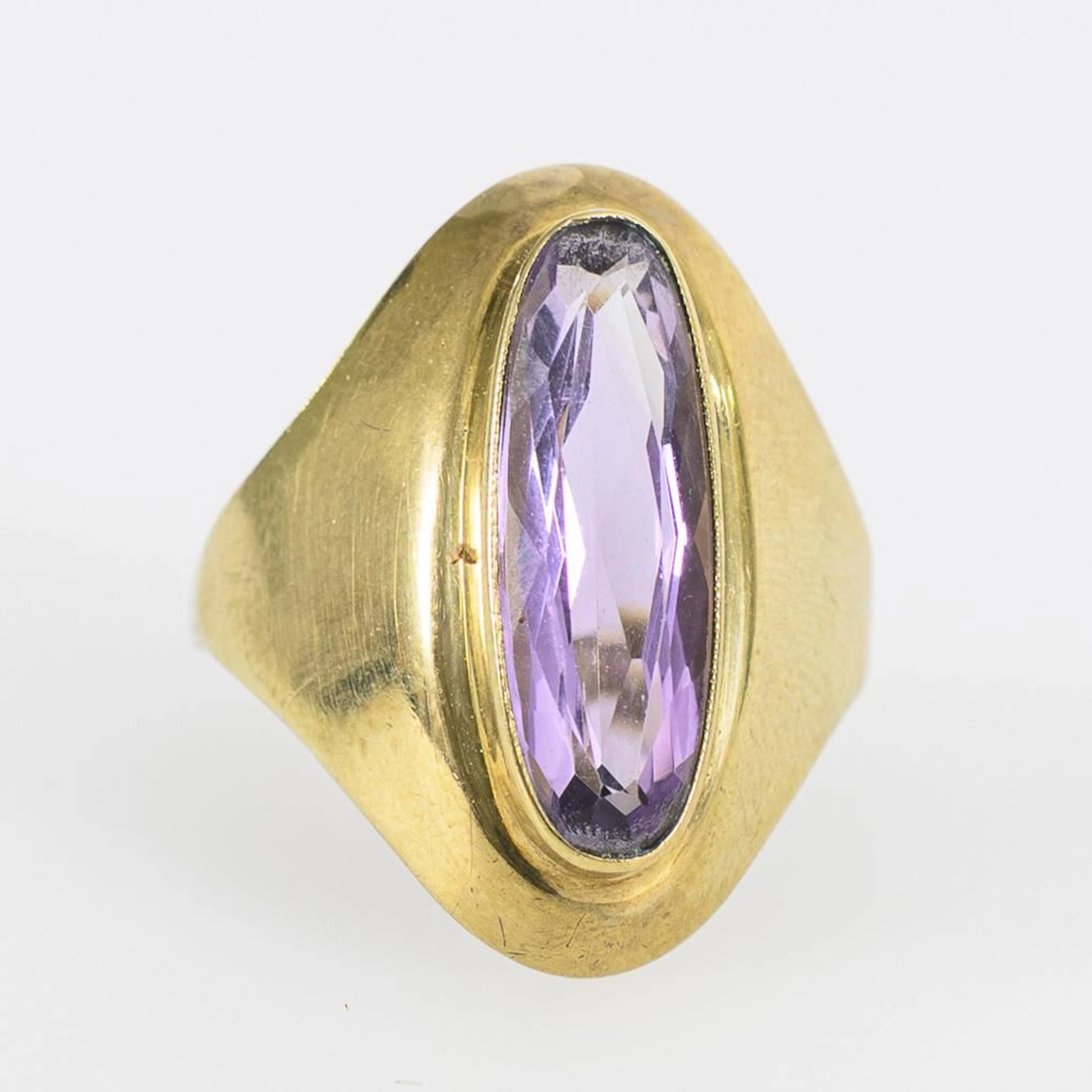 Ring with a large amethyst.