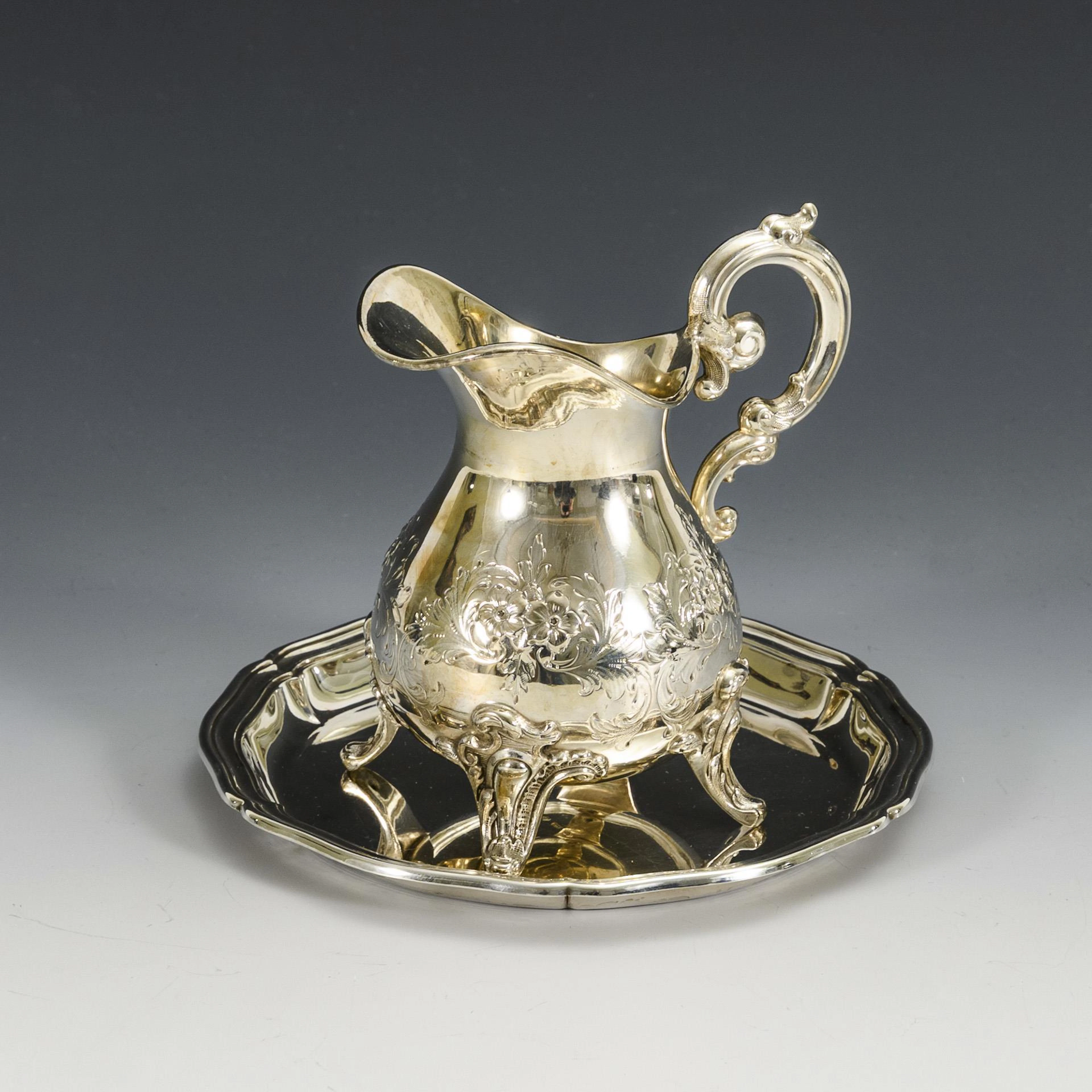 Scream jug and silver plate.