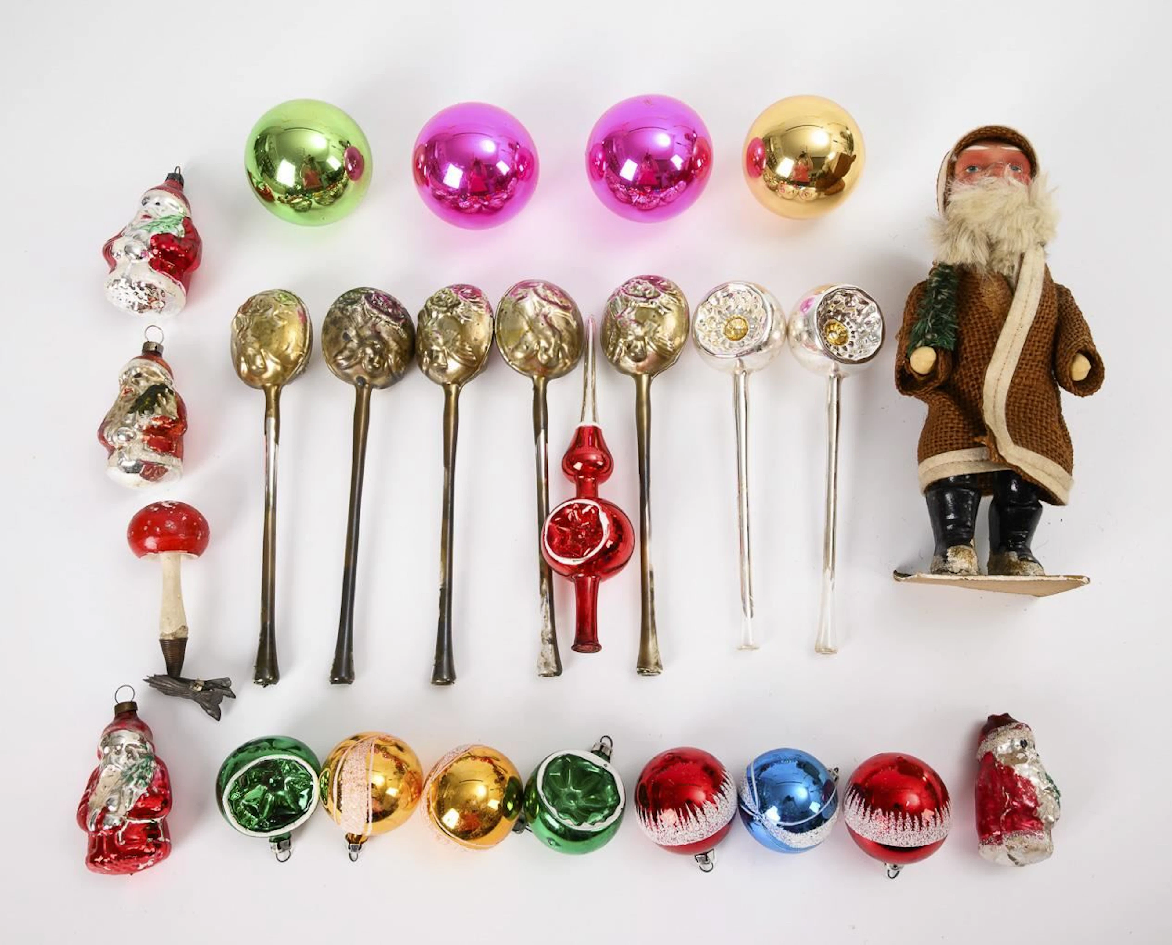 Old Santa Claus and some Christmas tree ornaments.