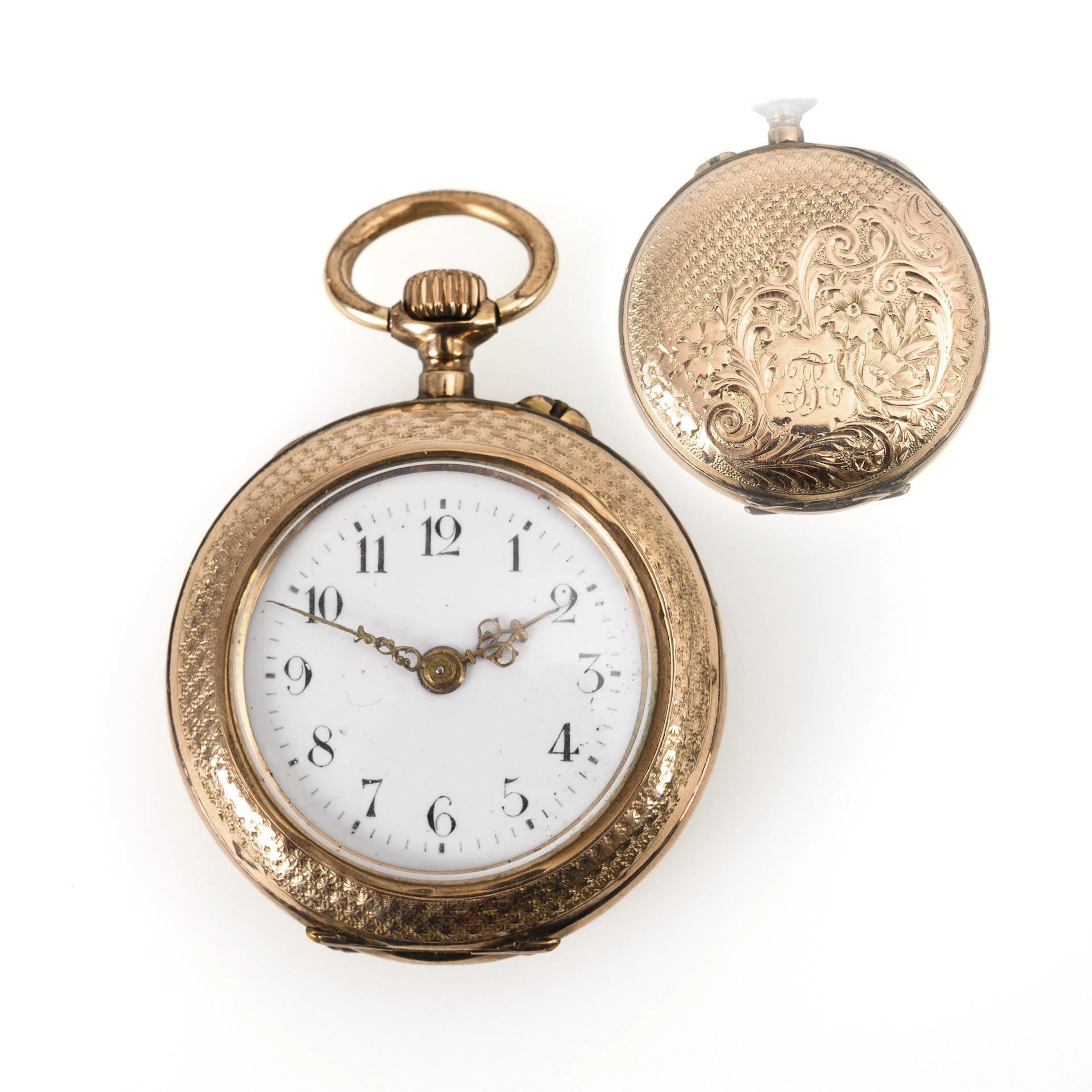 Woman's pocket watch with finely chased case.