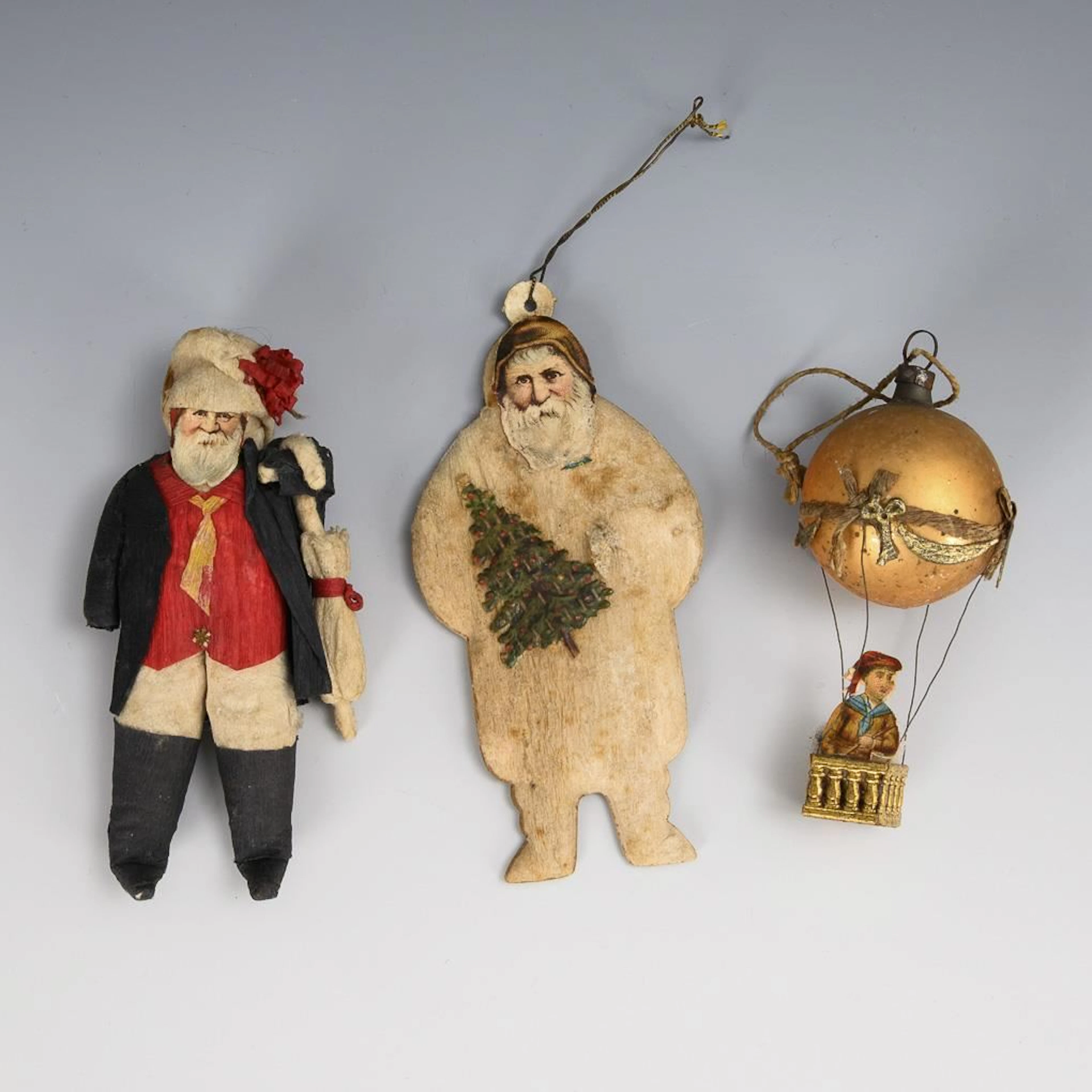 3 pieces of antique Christmas tree ornaments.