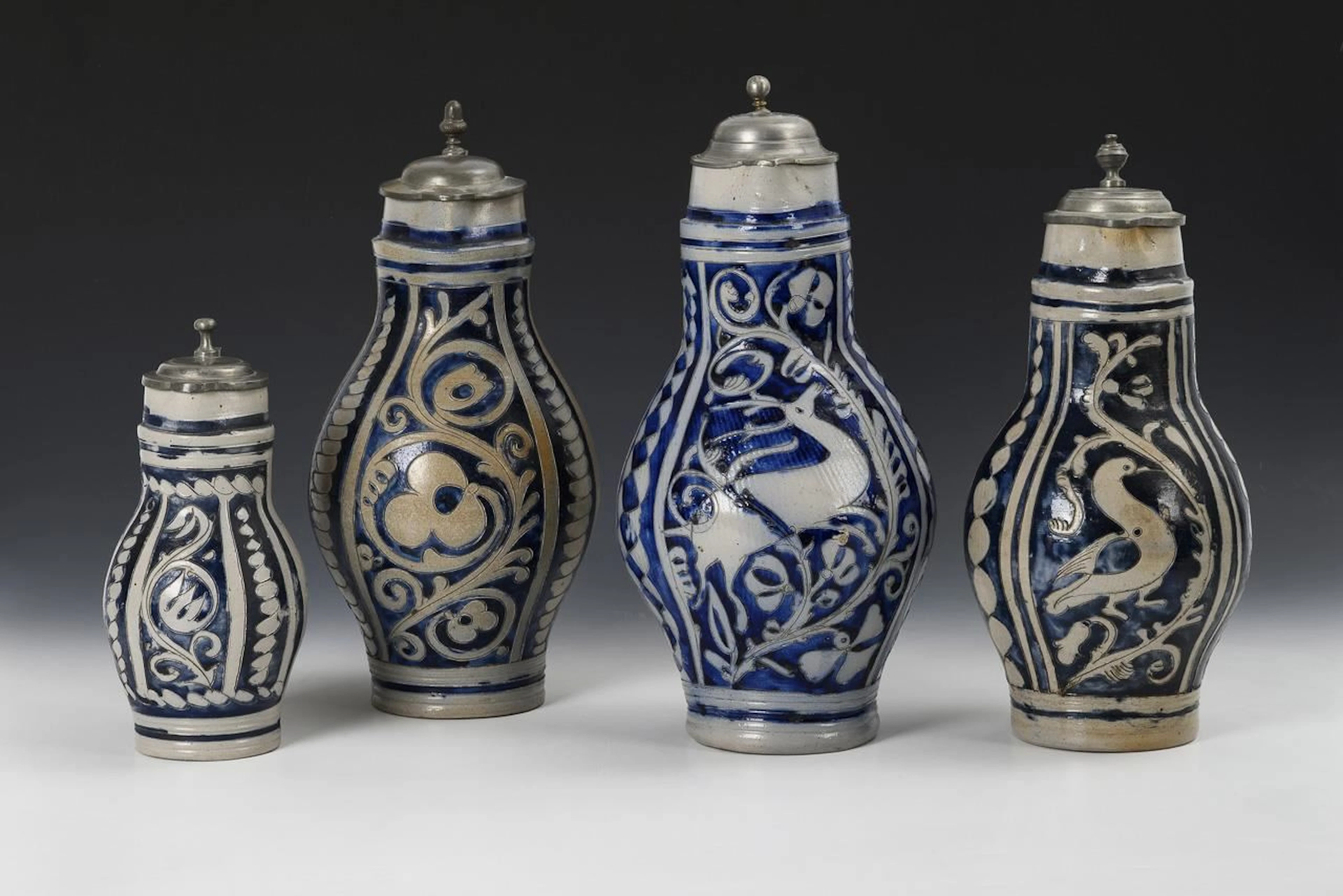4 pear-shaped jugs. Westerwald.