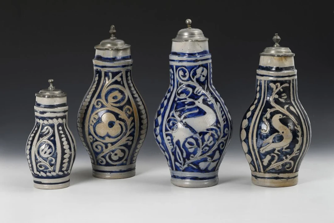 4 pear-shaped jugs. Westerwald.