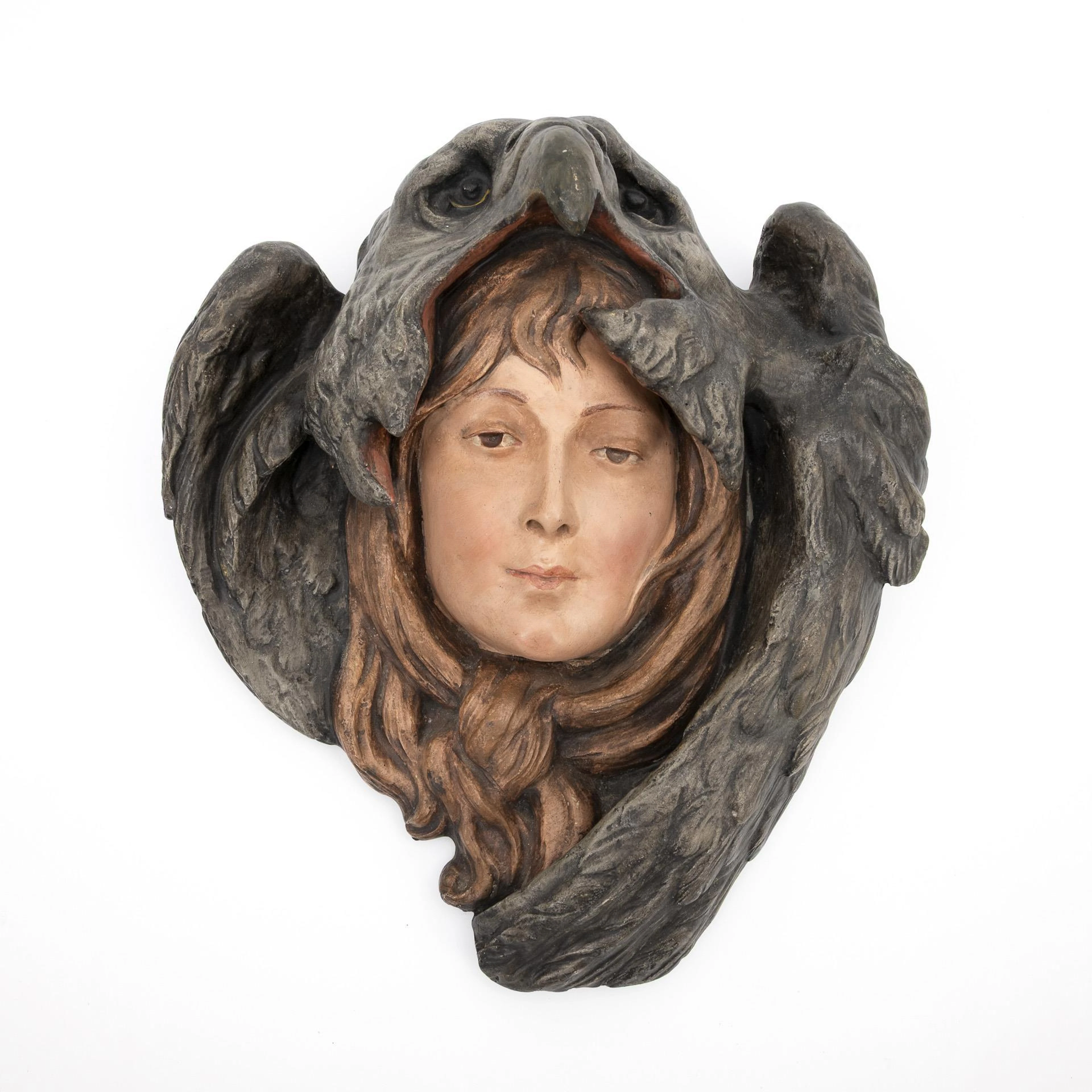 Art Nouveau terracotta wall mask "Girl's head with eagle hood".