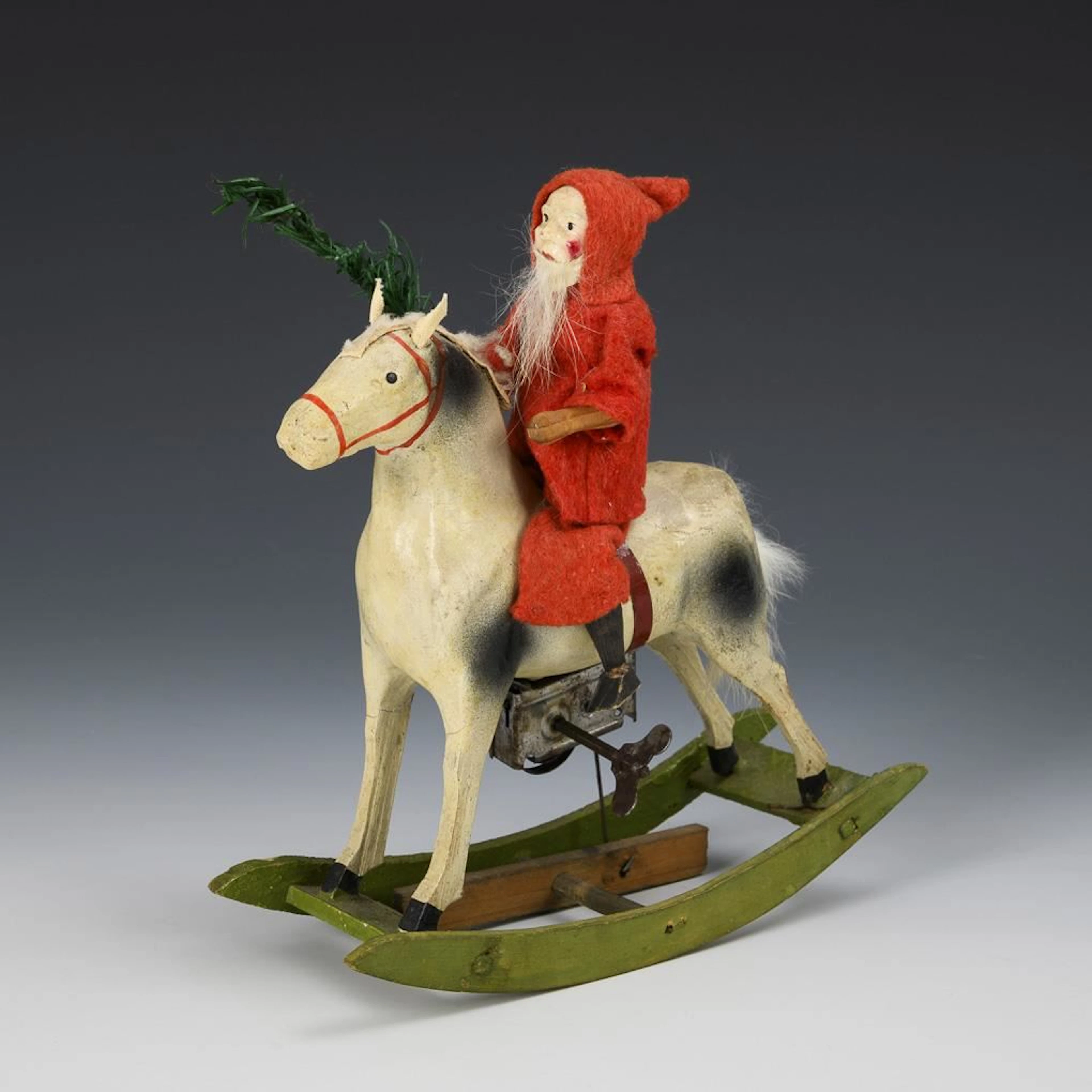 Santa Claus on a mechanical rocking horse.