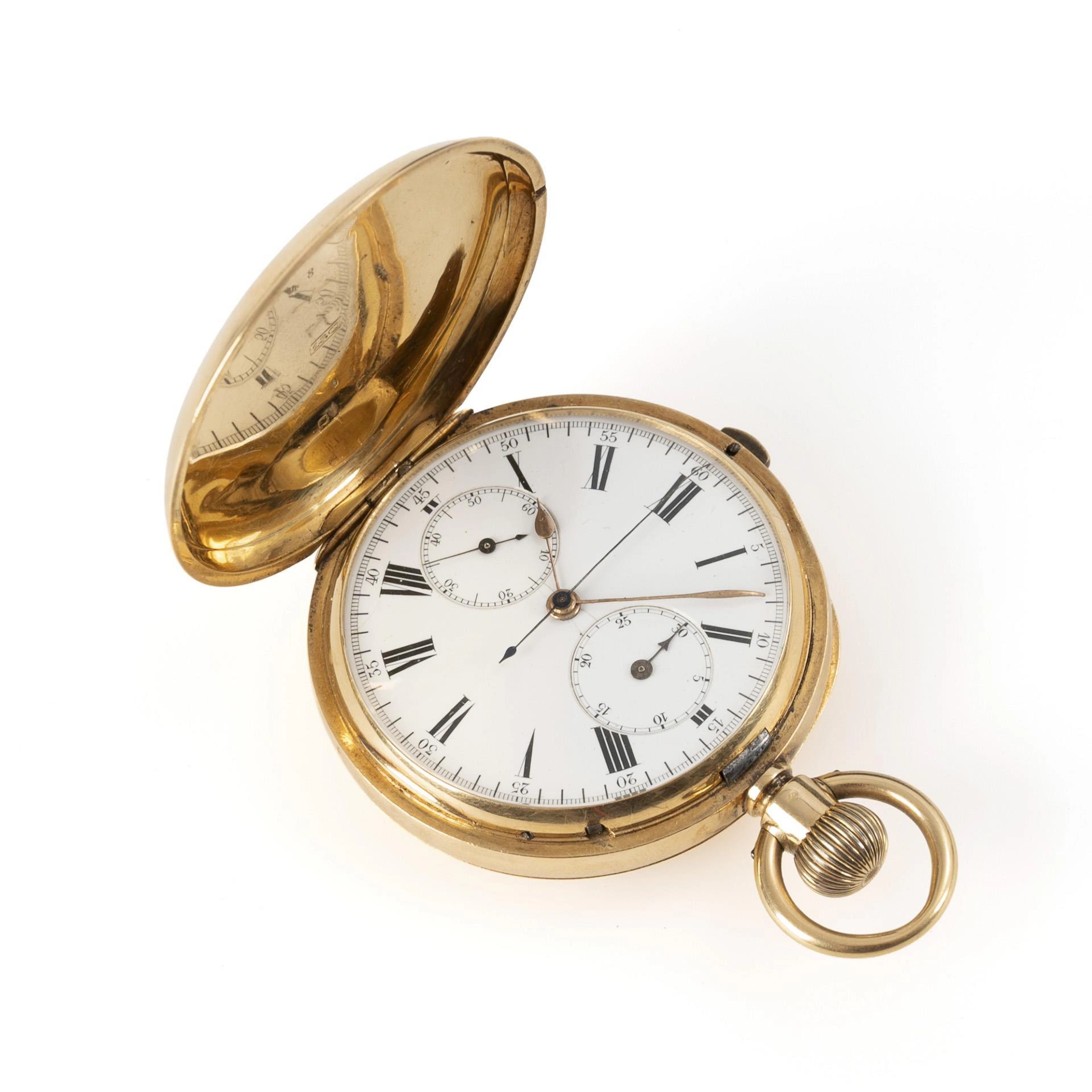 Gold chronograph with monogram engraving.