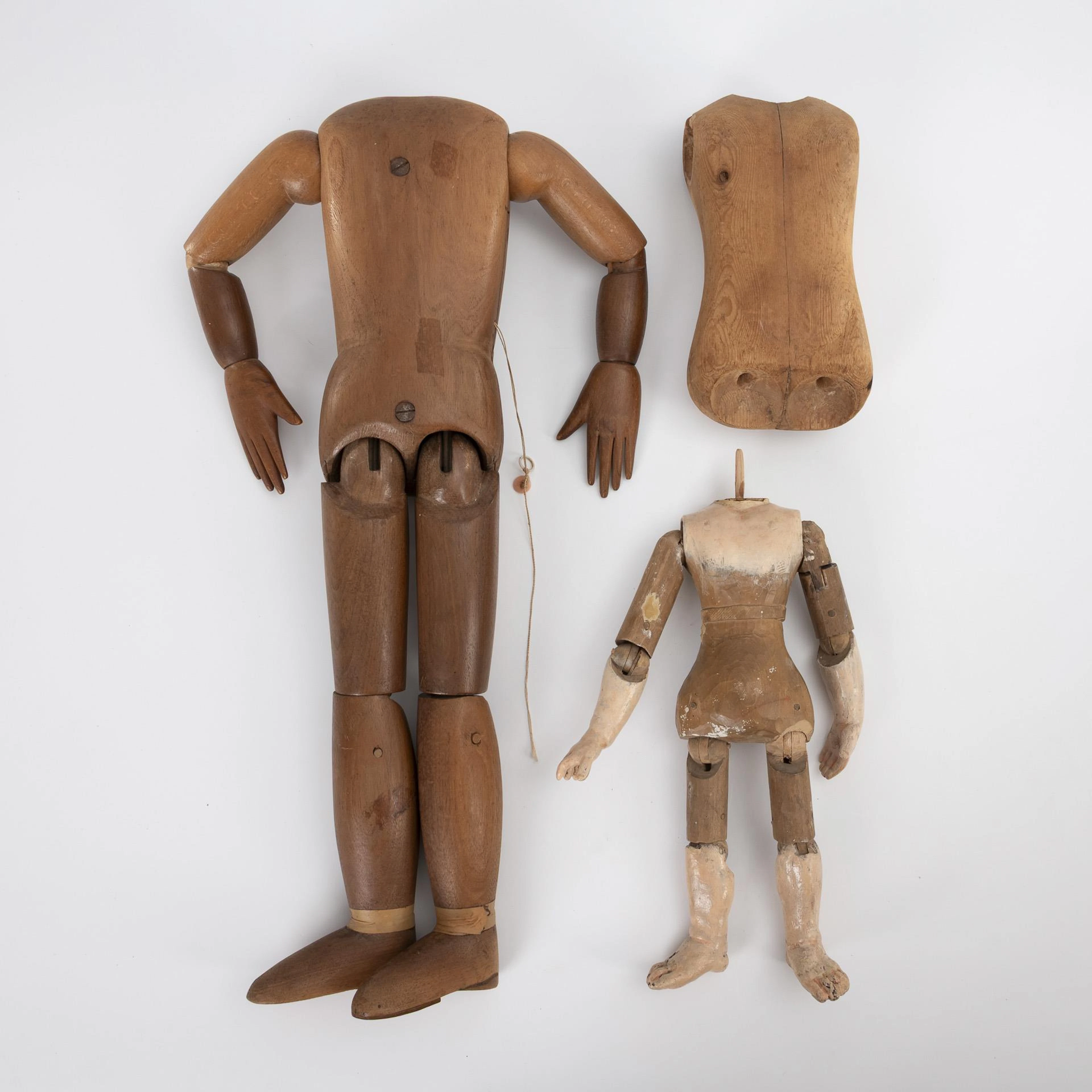 3 old wooden doll bodies.
