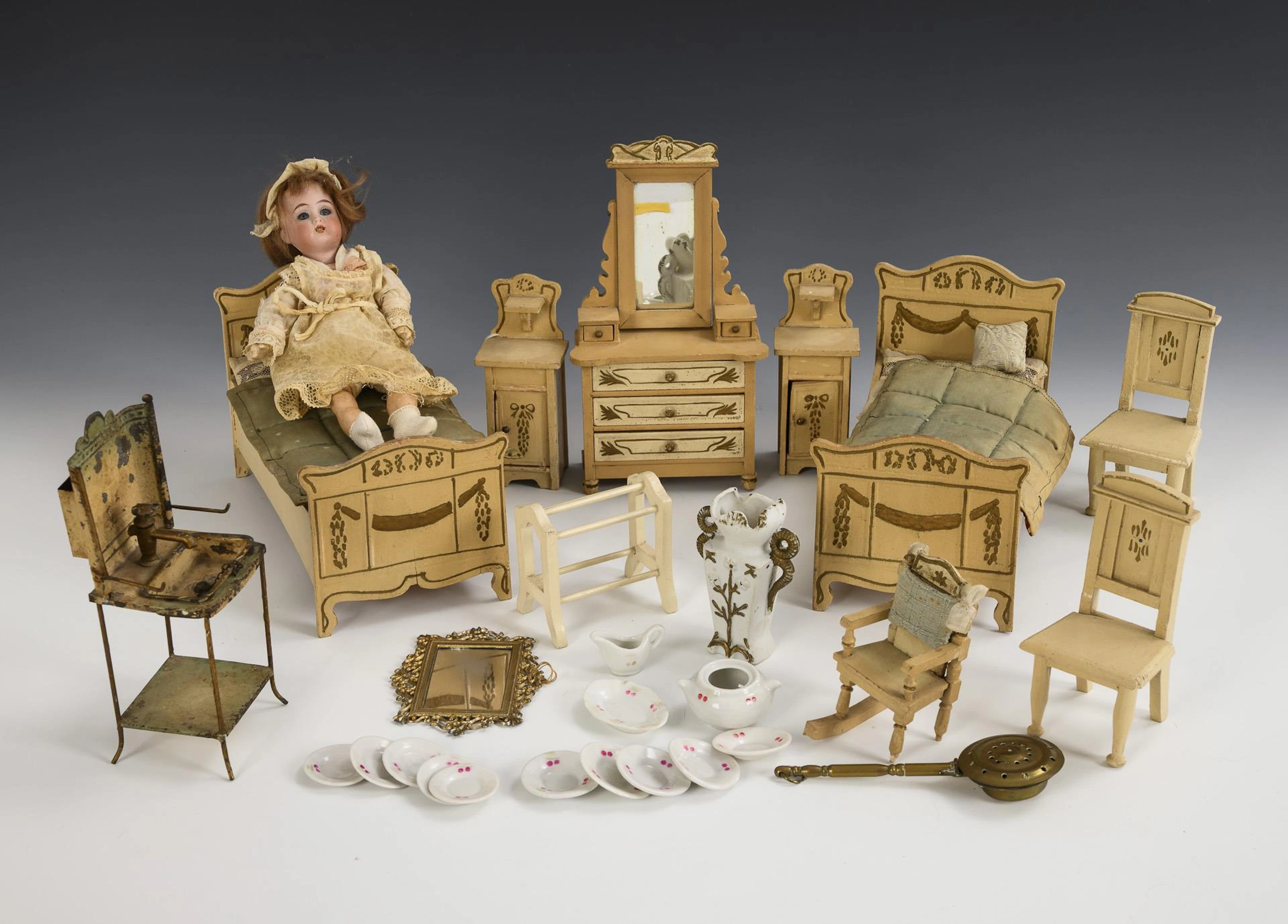 Small doll and Art Nouveau furniture for the doll's house.