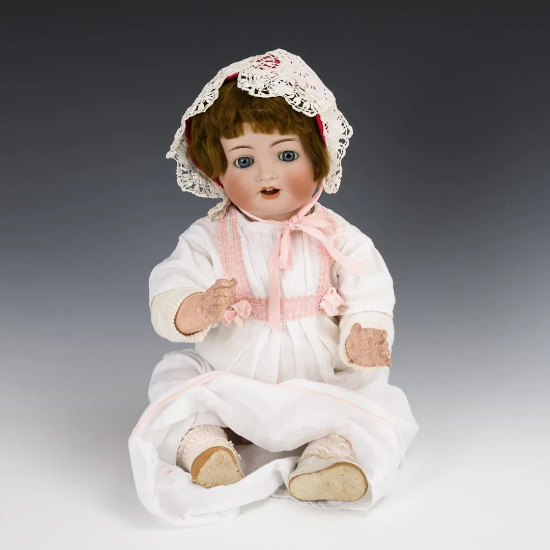 Character doll in a white dress. Kämmer & Reinhardt.