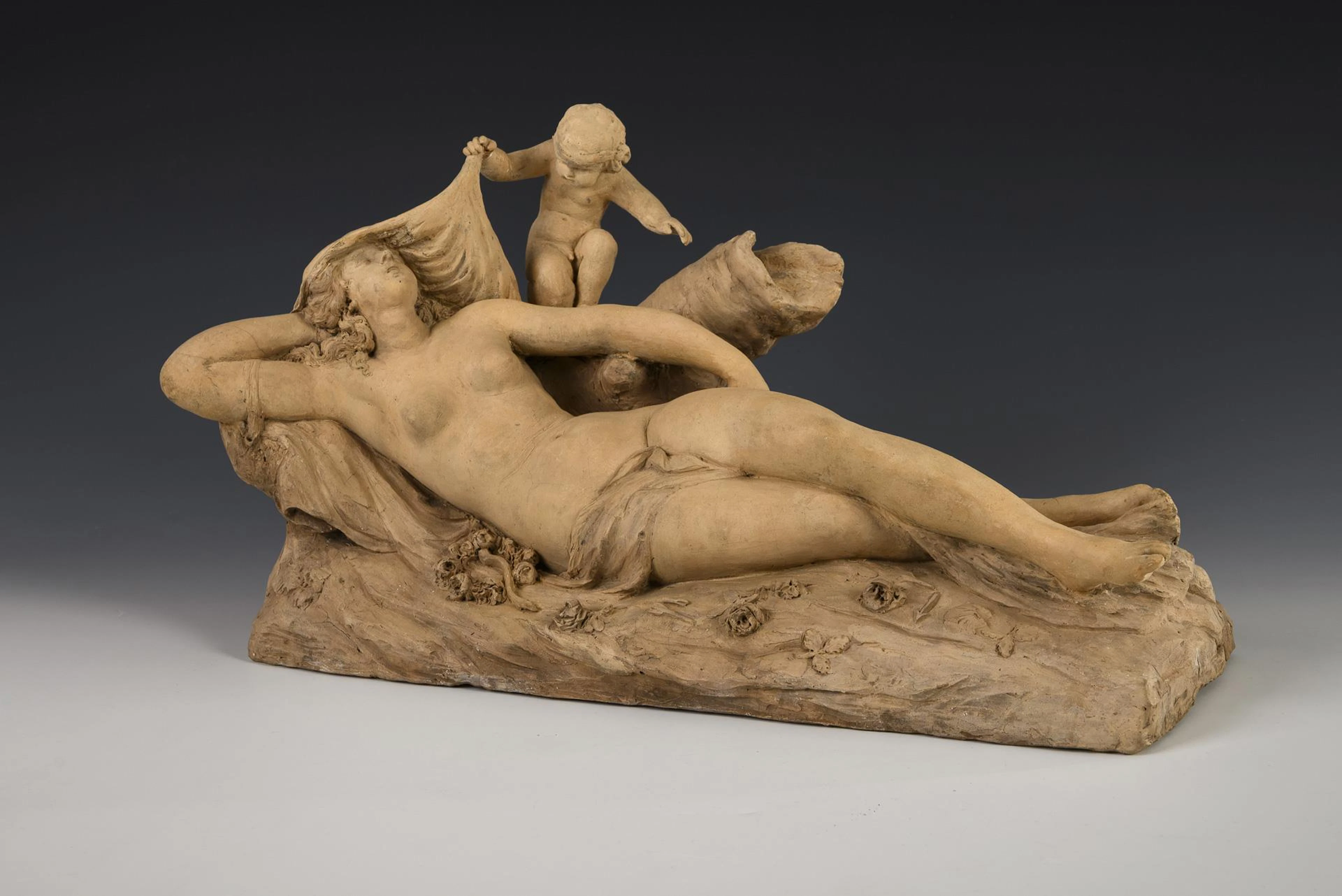 Sleeping figure with putto
