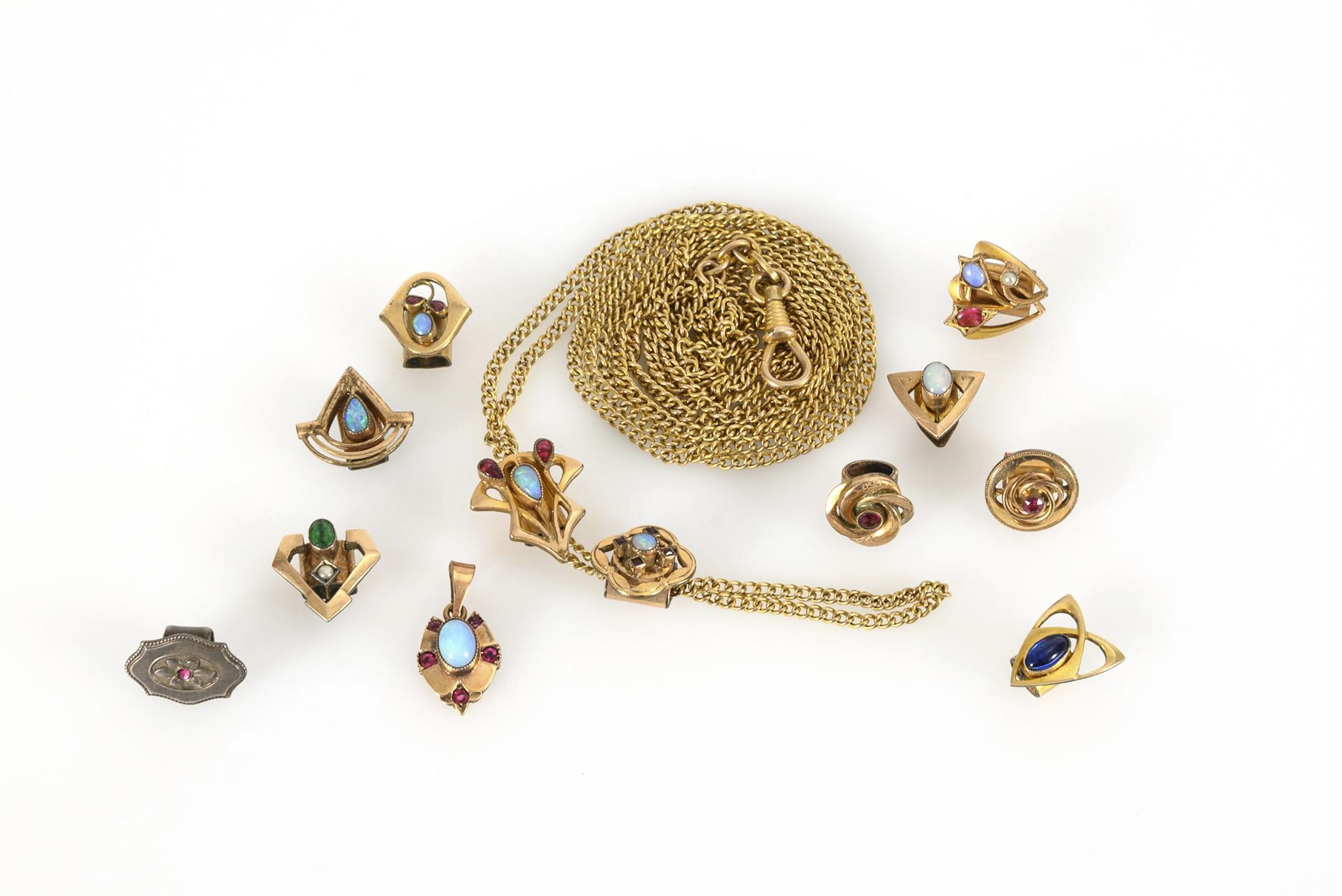 Small collection of watch chain pendants around 1900.