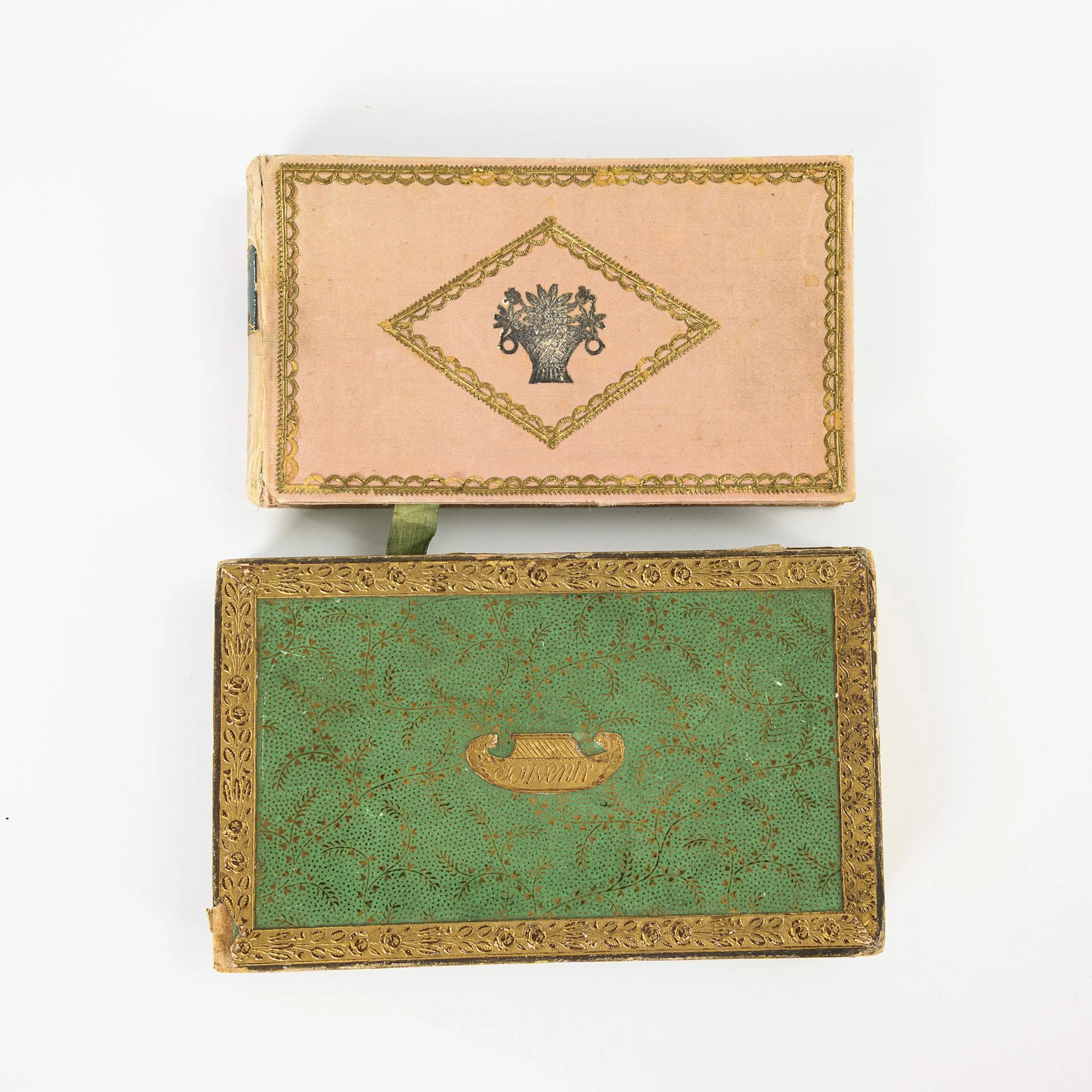 2 caskets with album leaves.