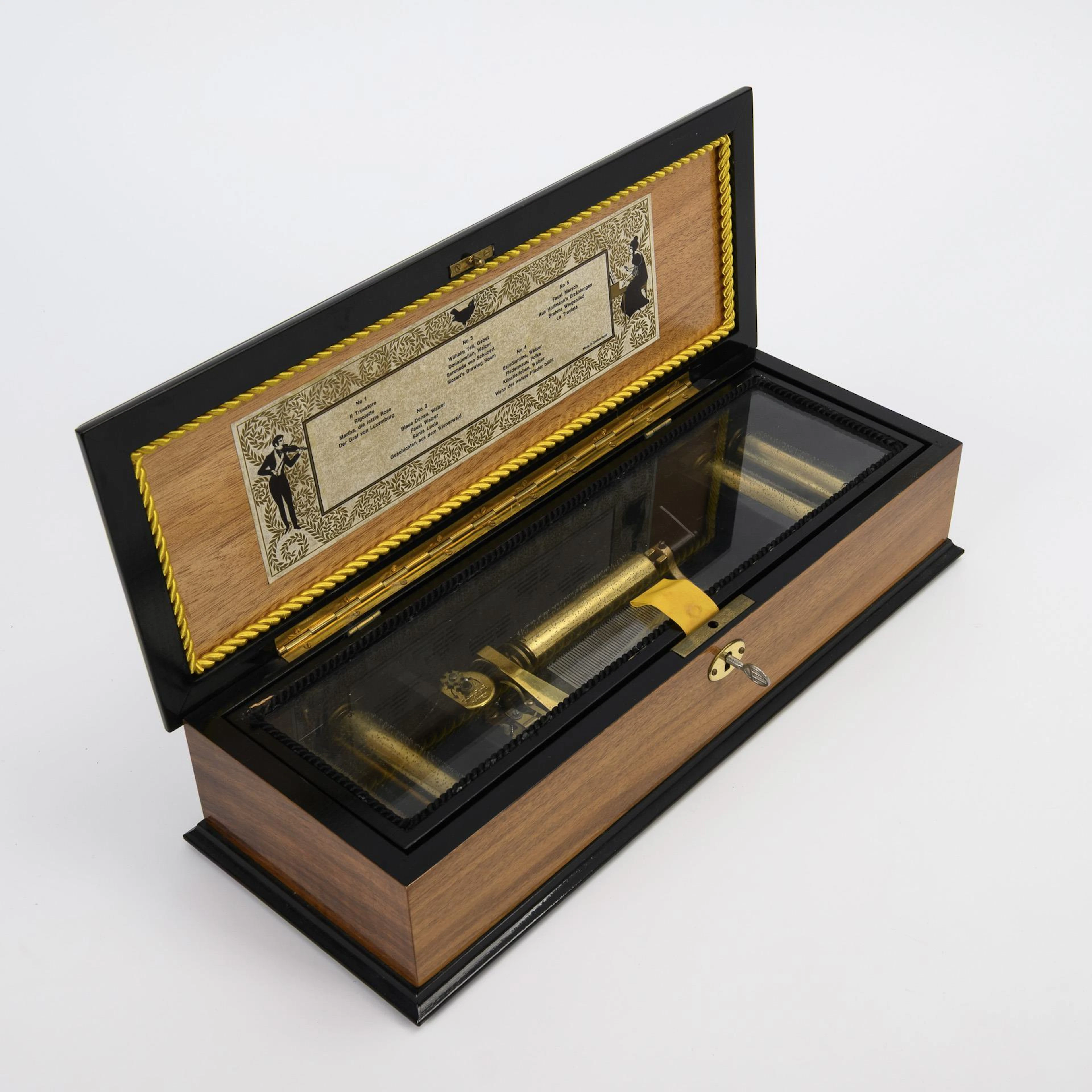 Younger music box with 5 interchangeable rollers.