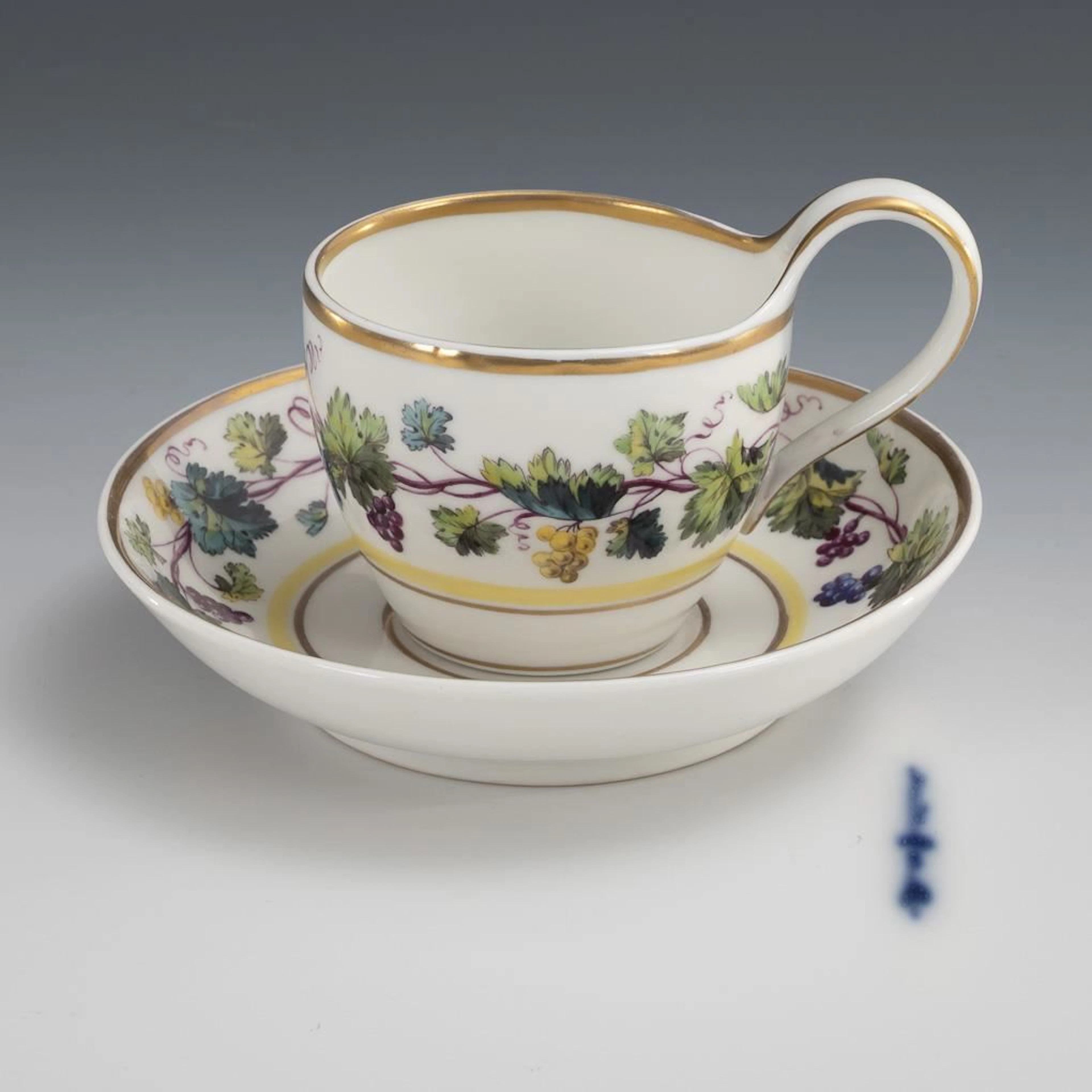 Biedermeier display cup with a vine border. KPM Berlin.