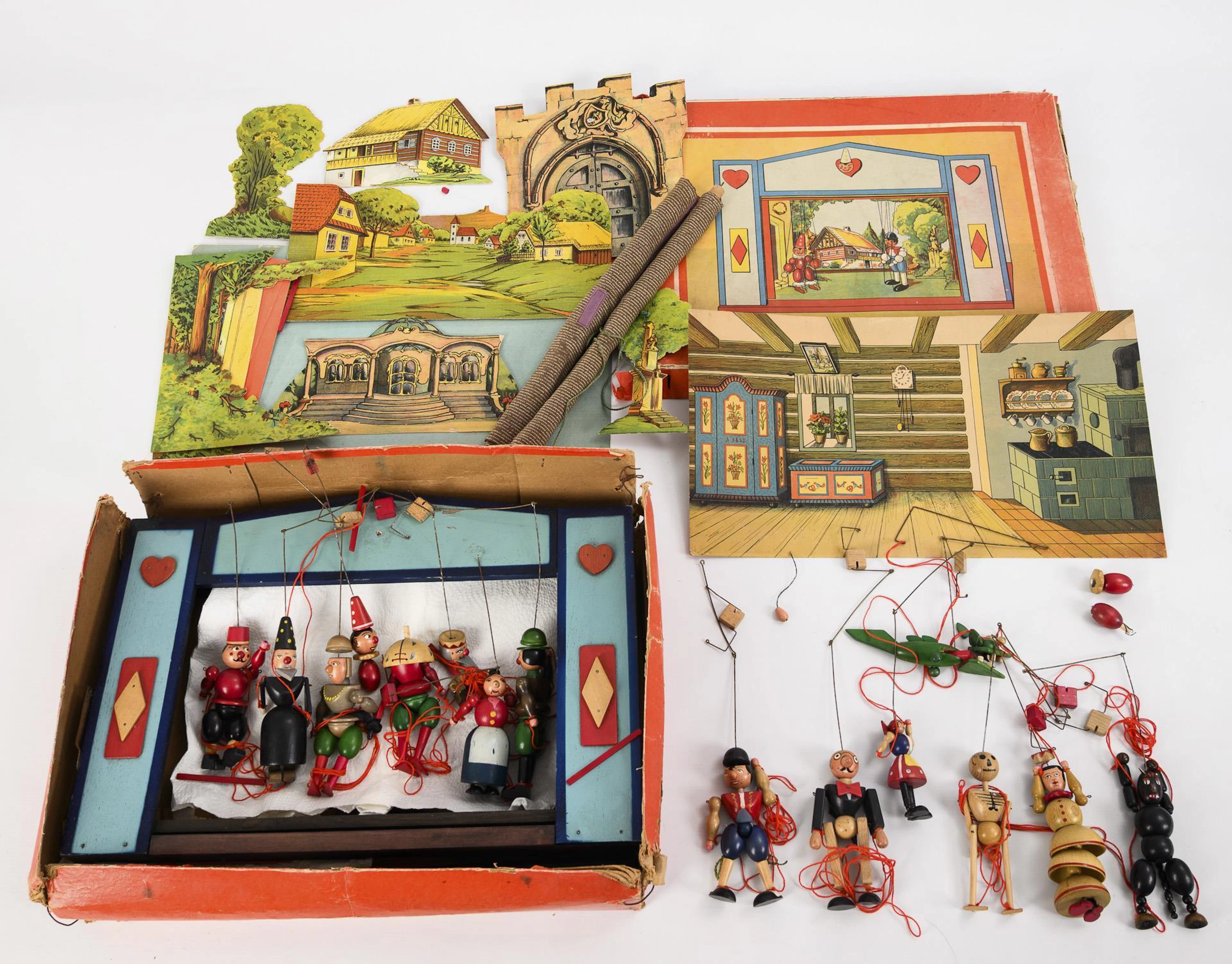 Puppet theater with small wooden marionettes.