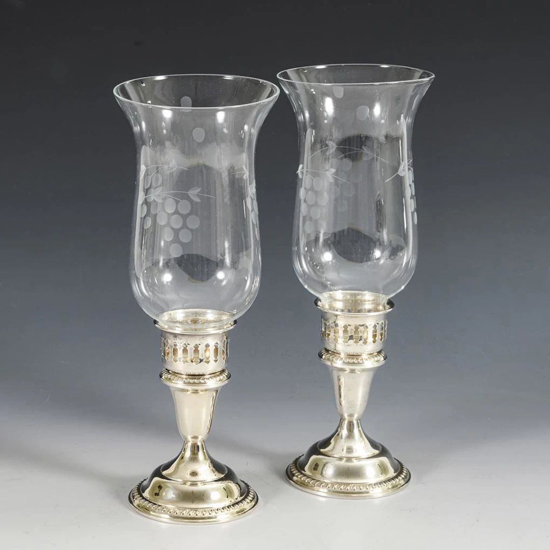 Pair of lanterns with silver bases.