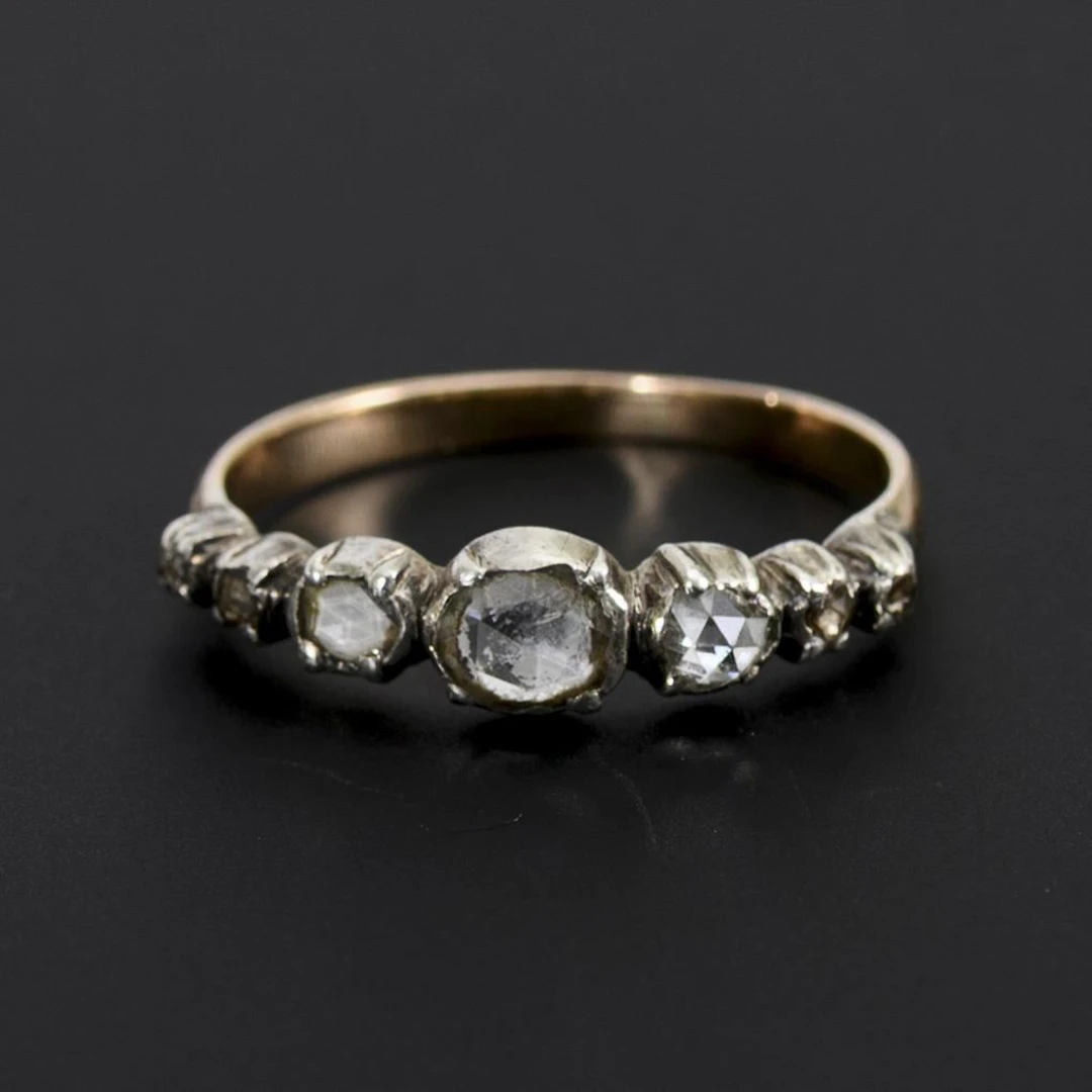 Historic-style ring with diamond roses.