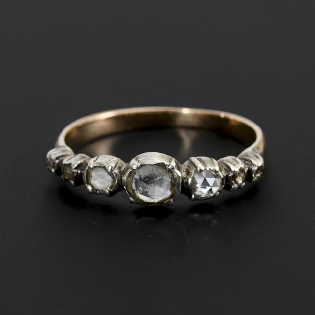 Historic-style ring with diamond roses.